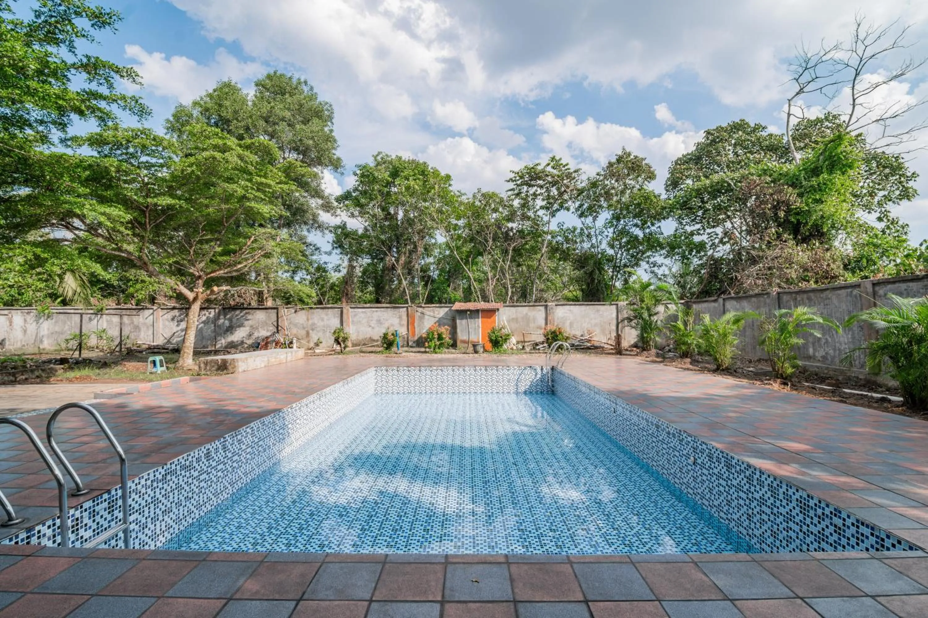 Swimming pool in Collection O Pusat Kota Pekanbaru Near Mall Ska Formerly Hotel Olgaria