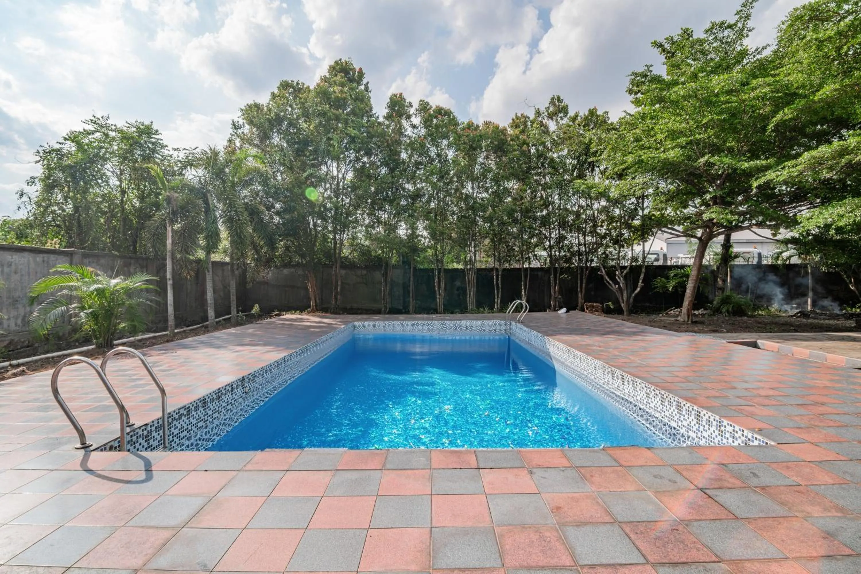 Swimming pool in Collection O Pusat Kota Pekanbaru Near Mall Ska Formerly Hotel Olgaria