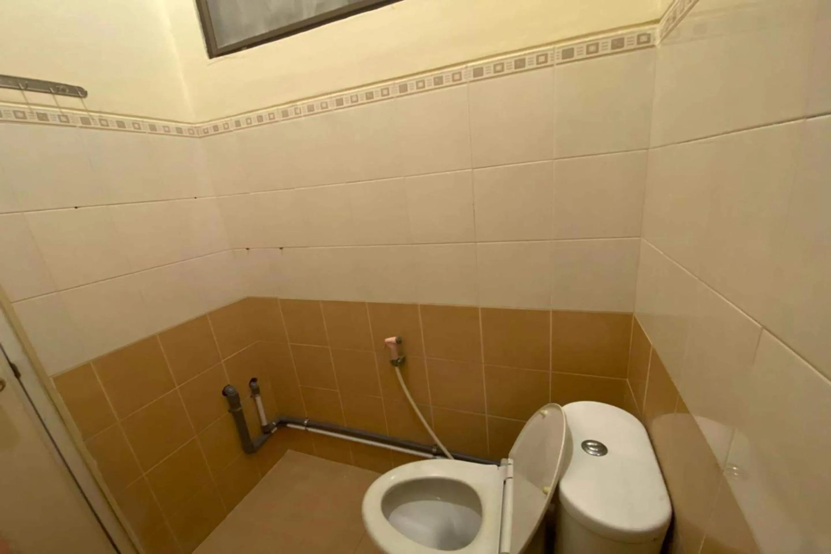 Bathroom in Hotel O Sweet Home Residence Simpang Lima