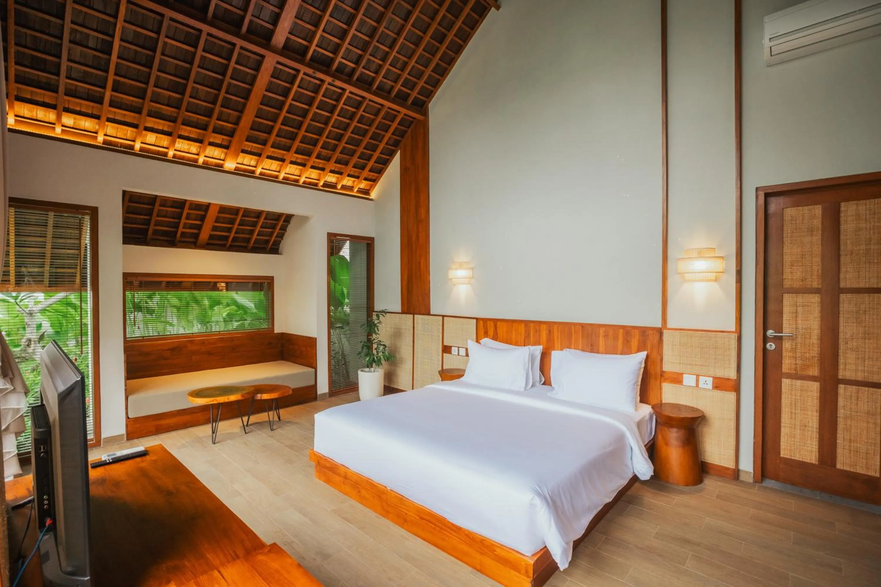 Bed in Arpana Luxury Private Pool Villas