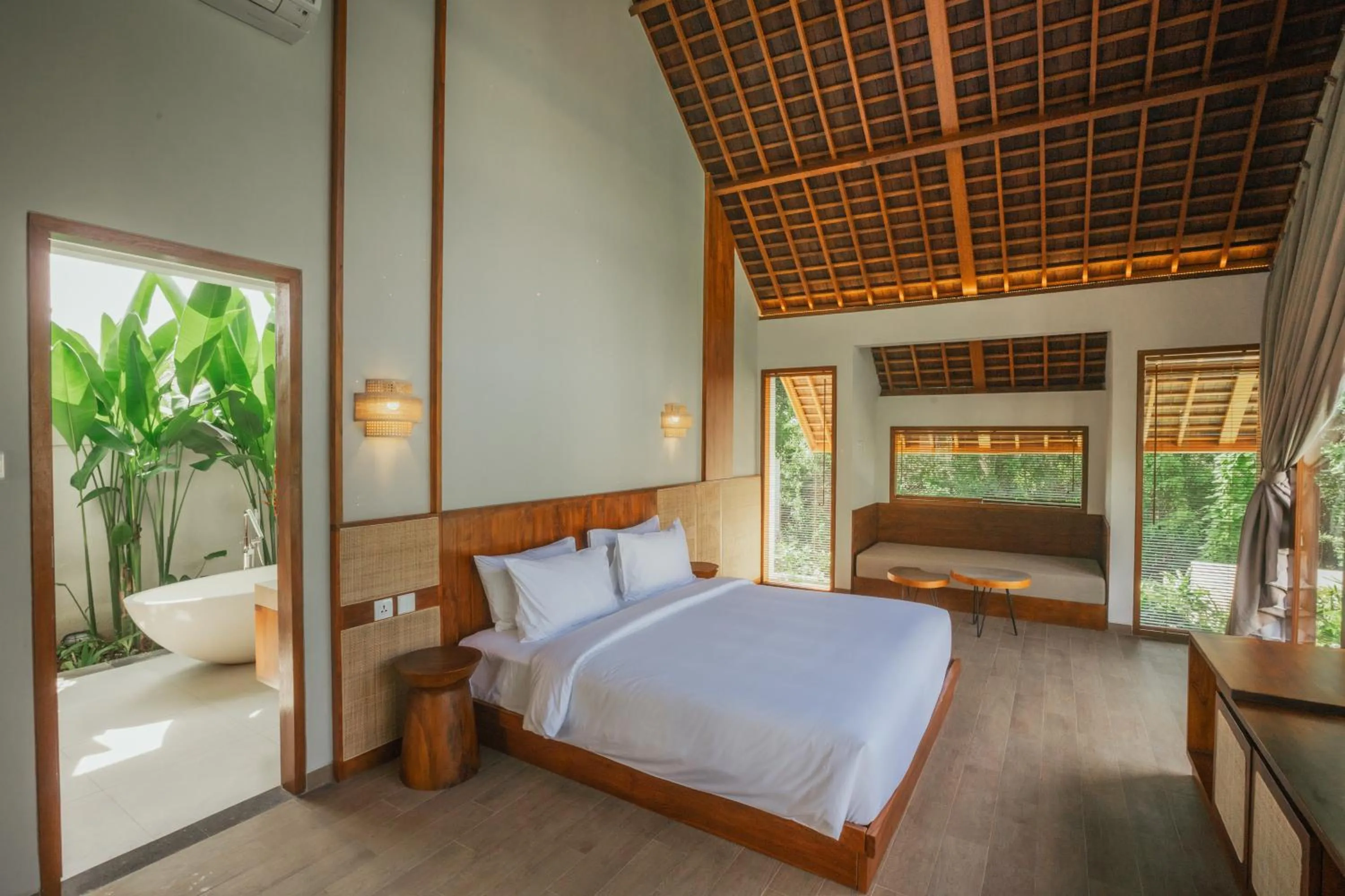Bed in Arpana Luxury Private Pool Villas