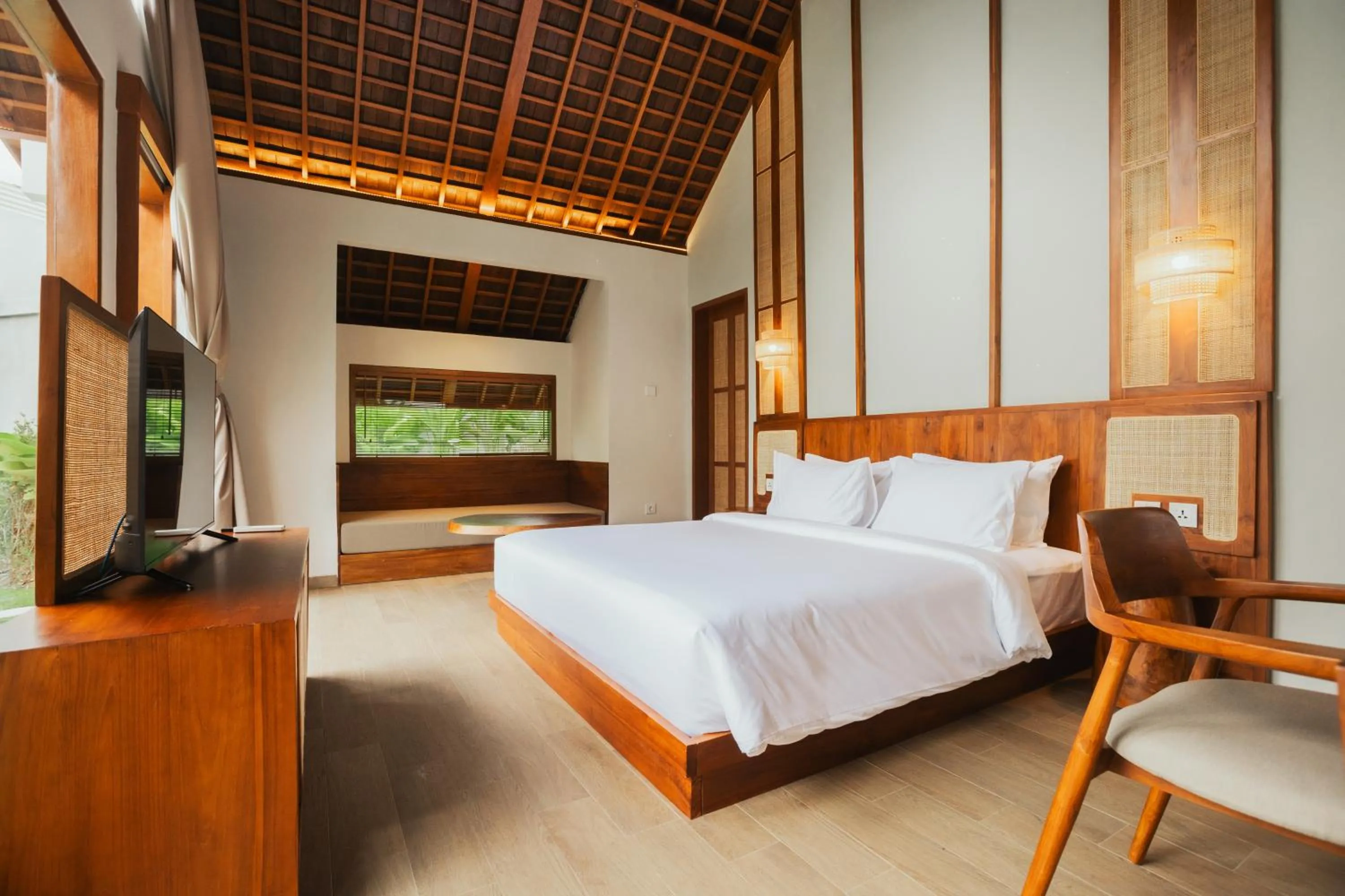 Bed in Arpana Luxury Private Pool Villas