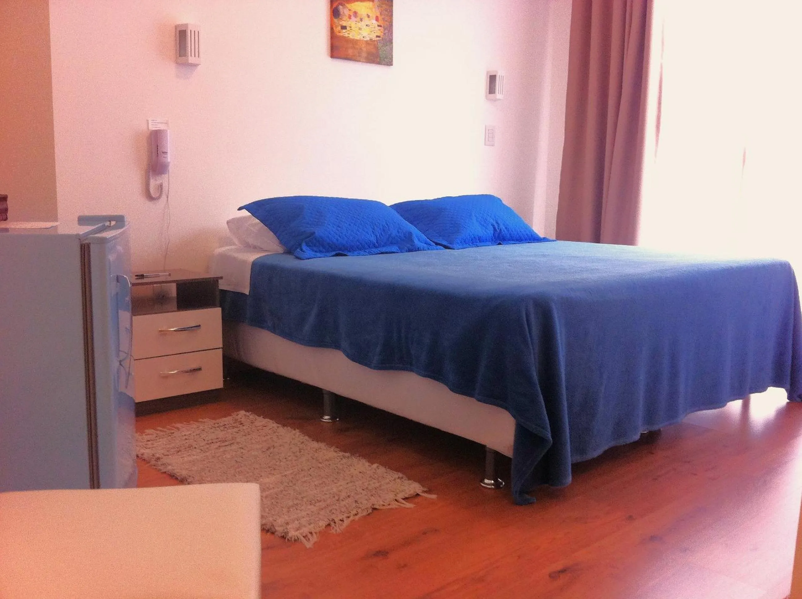 Bed in The Hyperion Boutique Hotel