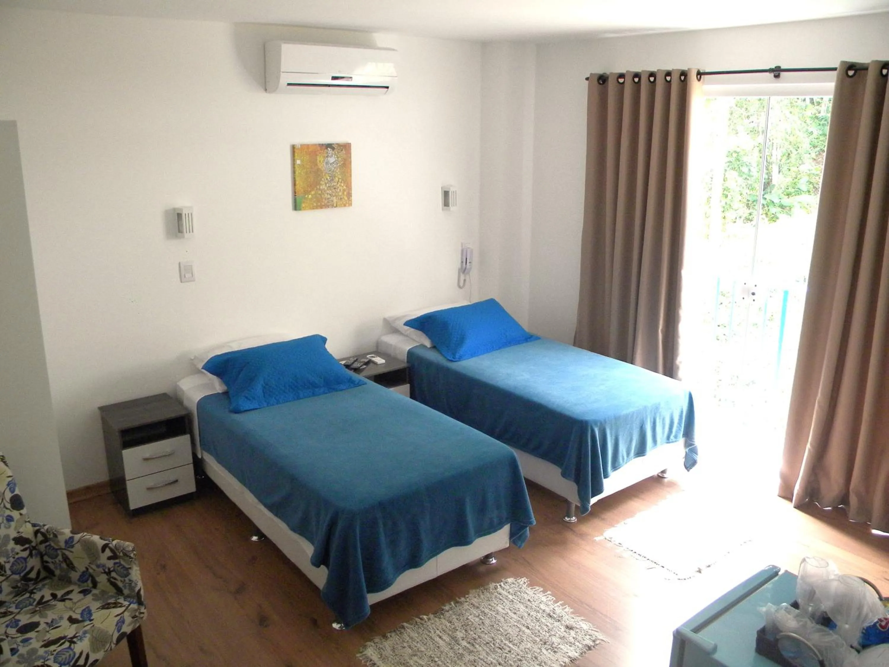 Bed in The Hyperion Boutique Hotel