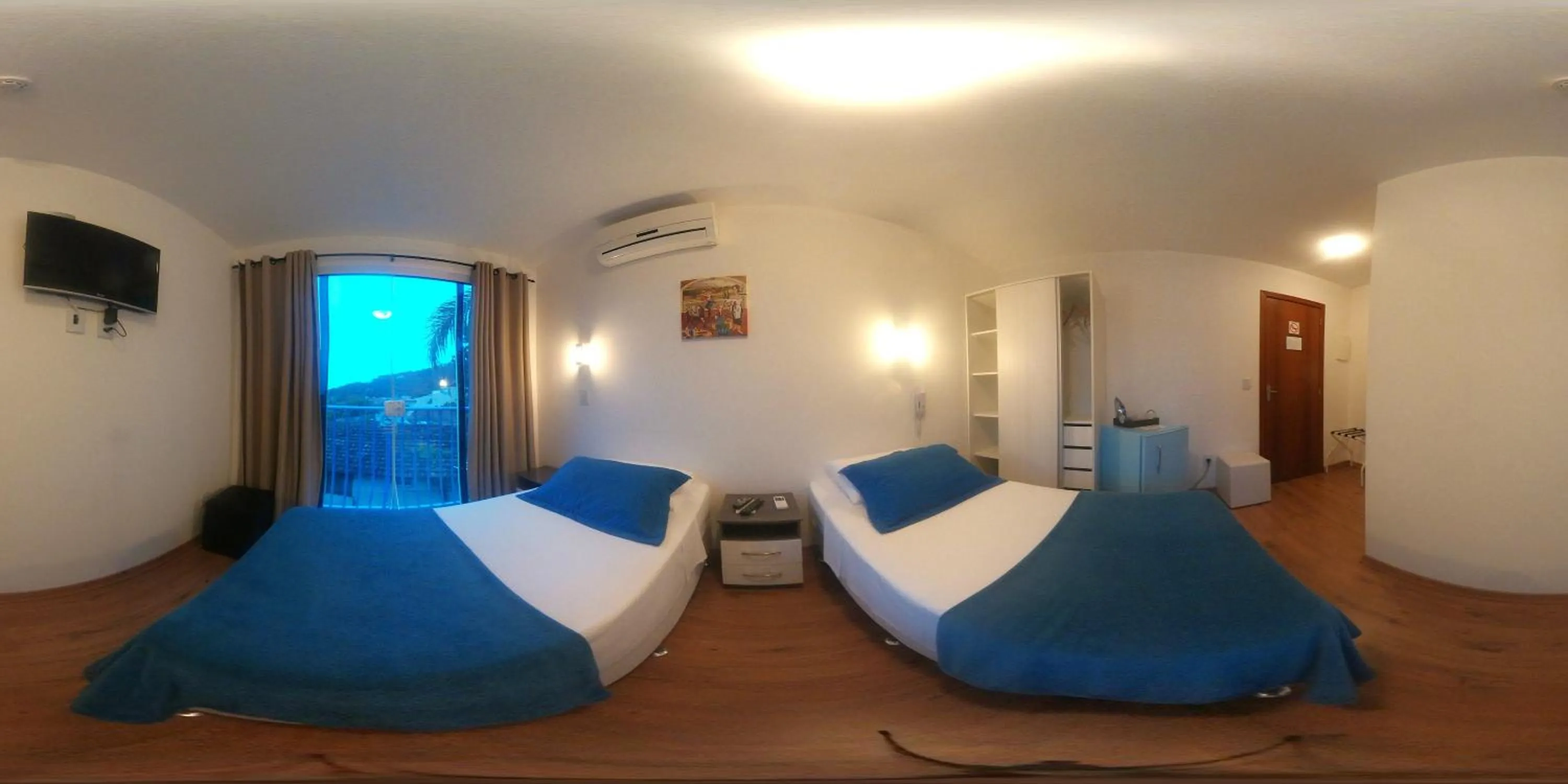 Bed in The Hyperion Boutique Hotel