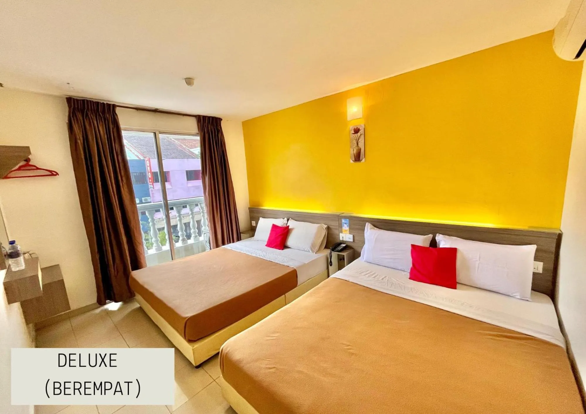 Bed in Yellow Mansion Hotel Melaka Raya