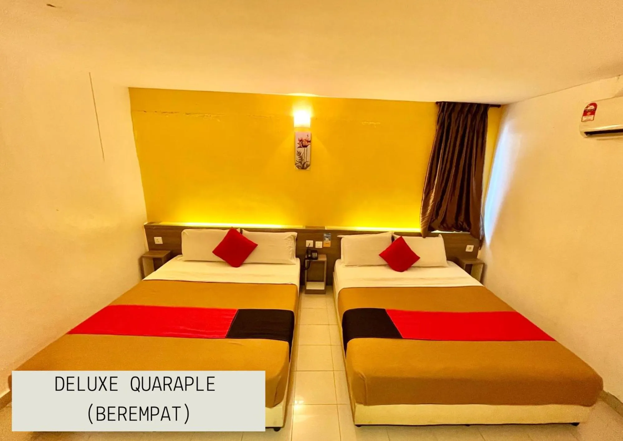 Bed in Yellow Mansion Hotel Melaka Raya