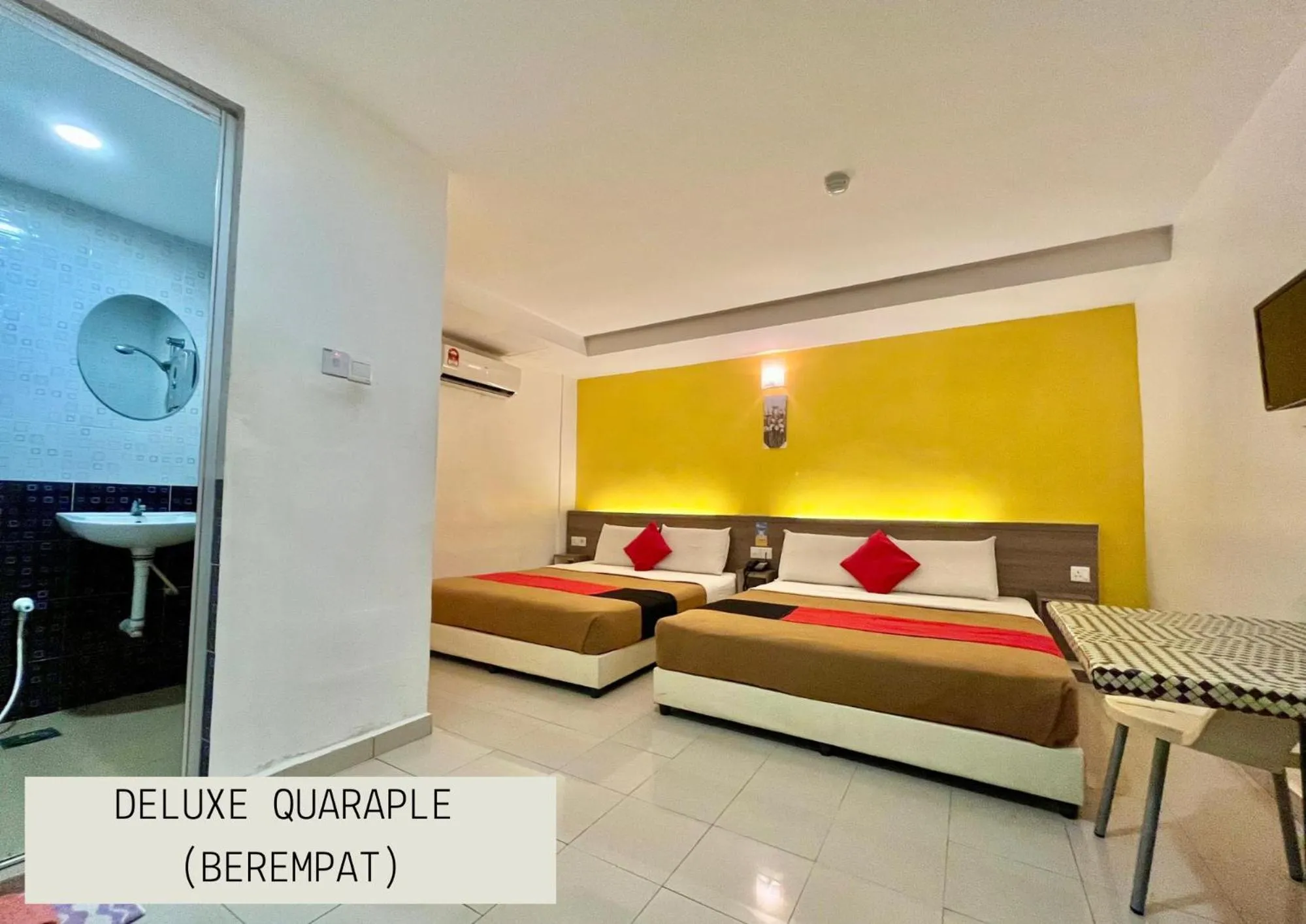 Bed in Yellow Mansion Hotel Melaka Raya