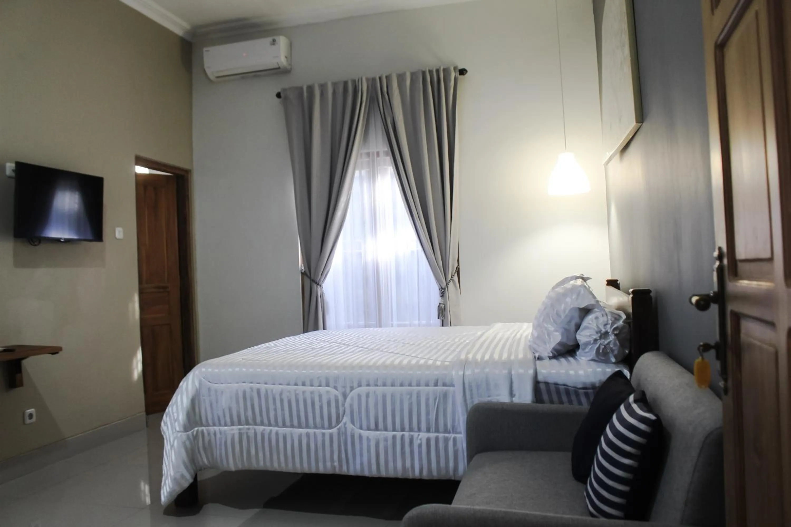 Bed in ELHA Heritage Yogyakarta