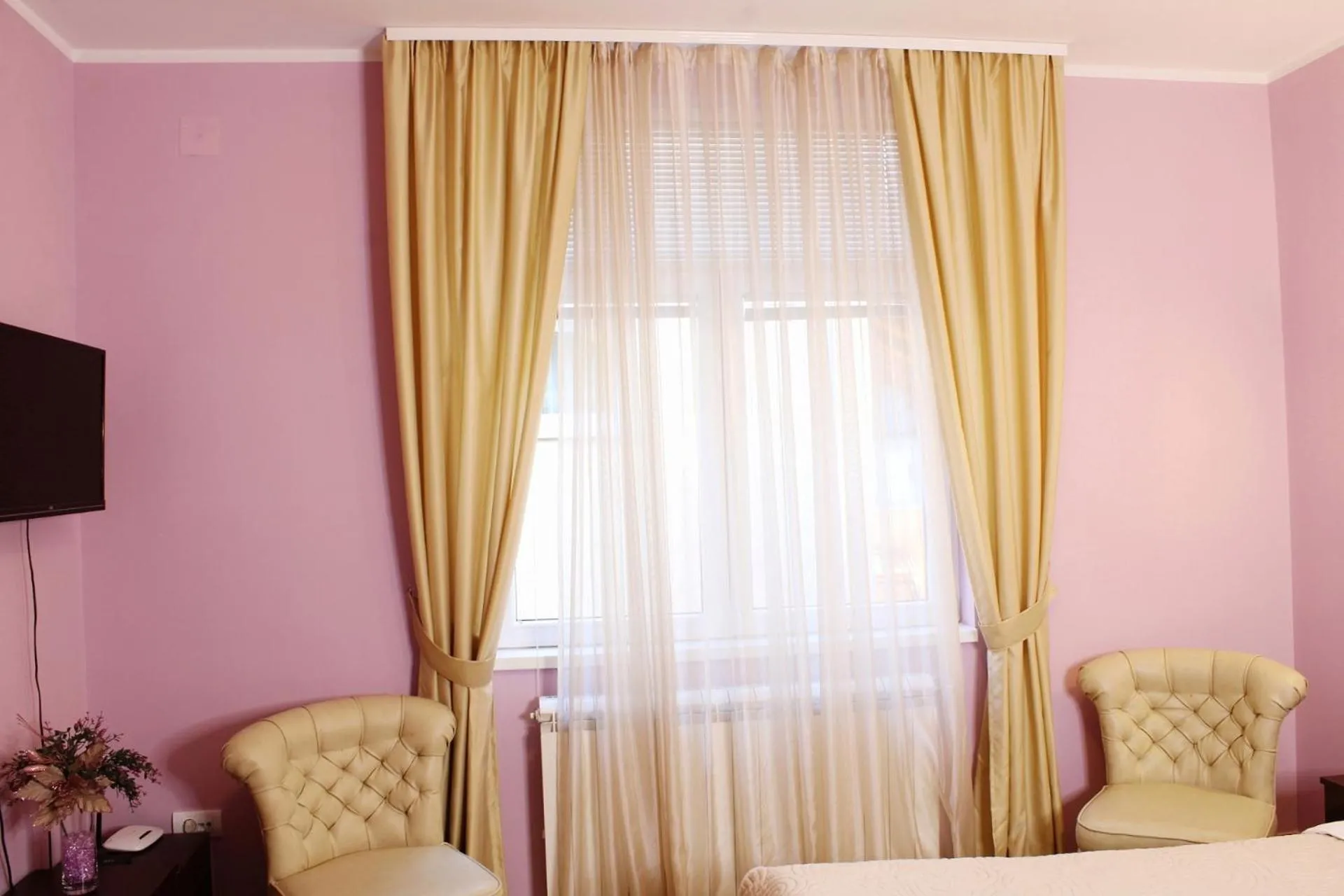 Bed in Apartments Paradisos
