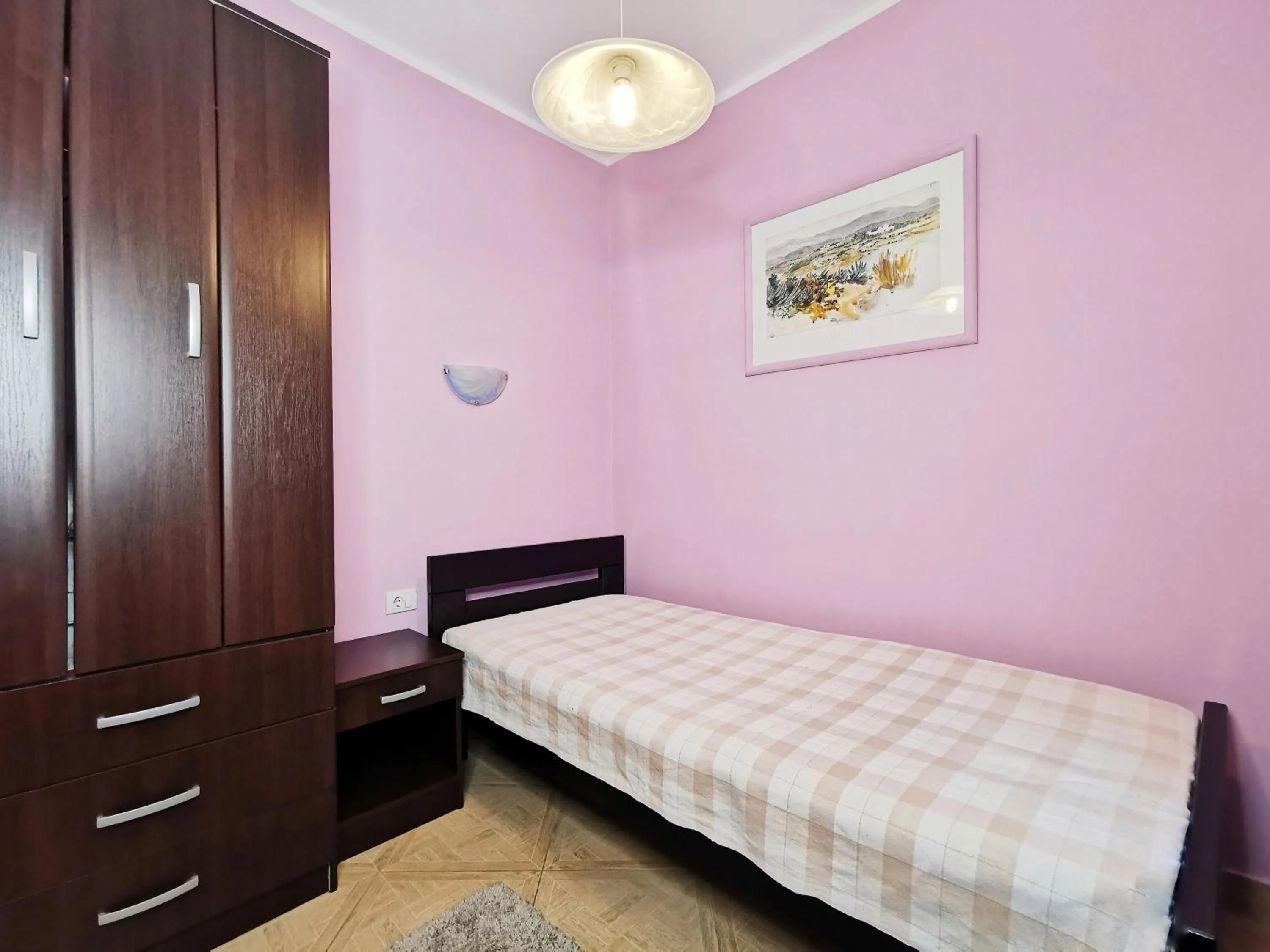 Bed in Apartments Paradisos