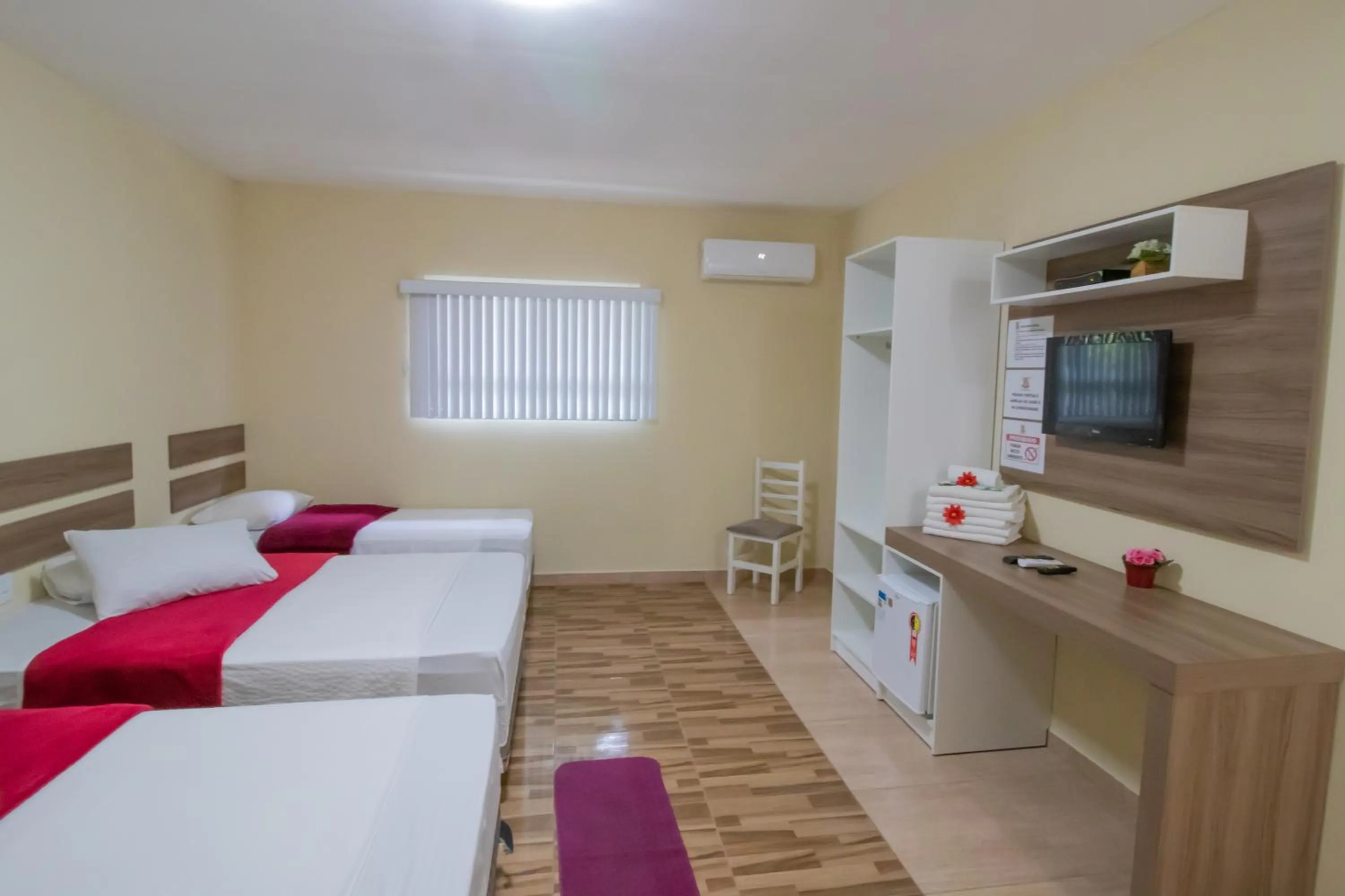 Bed in Pousada Vovó Dilma