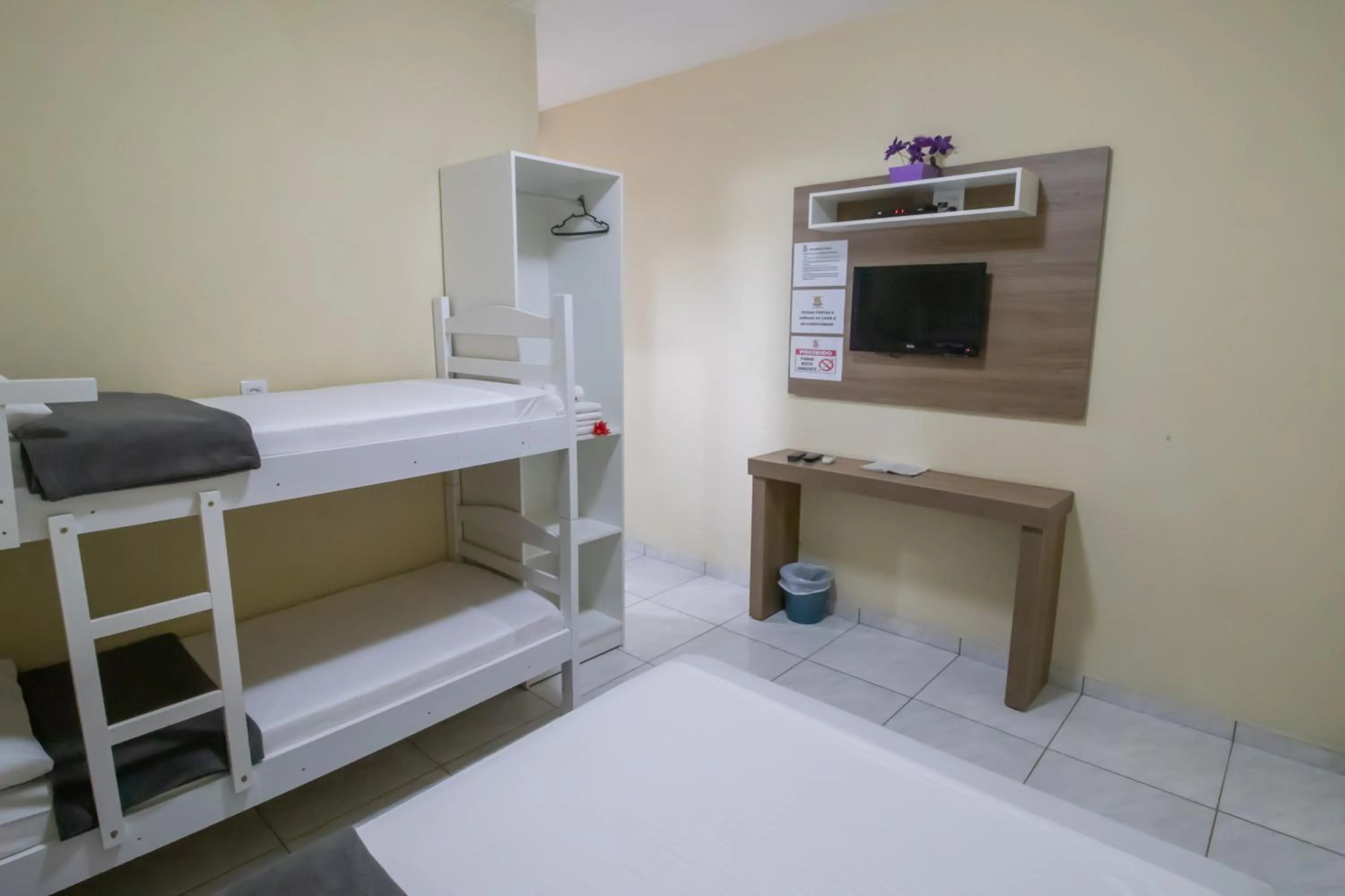 Bed in Pousada Vovó Dilma