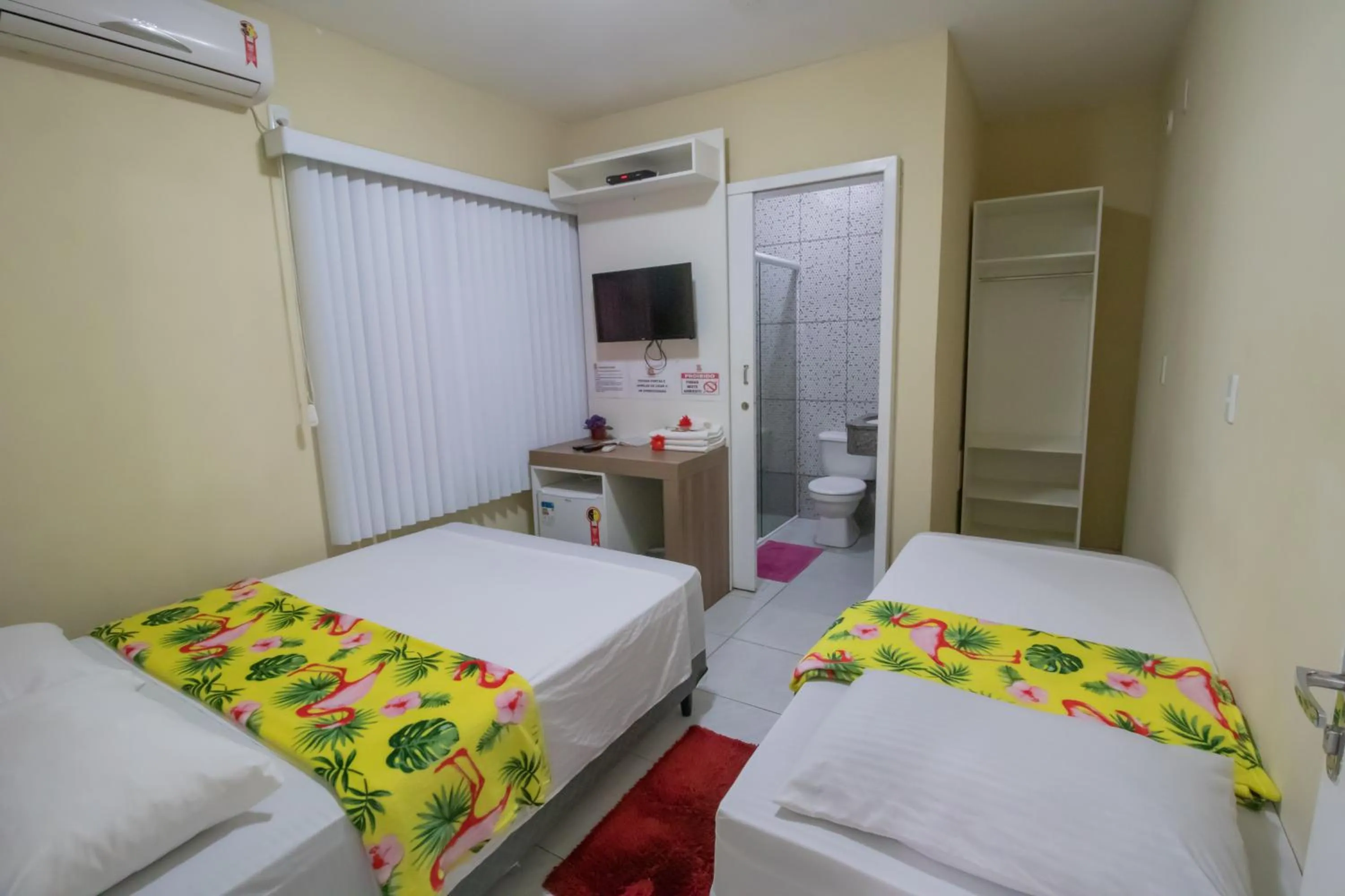 Bed in Pousada Vovó Dilma