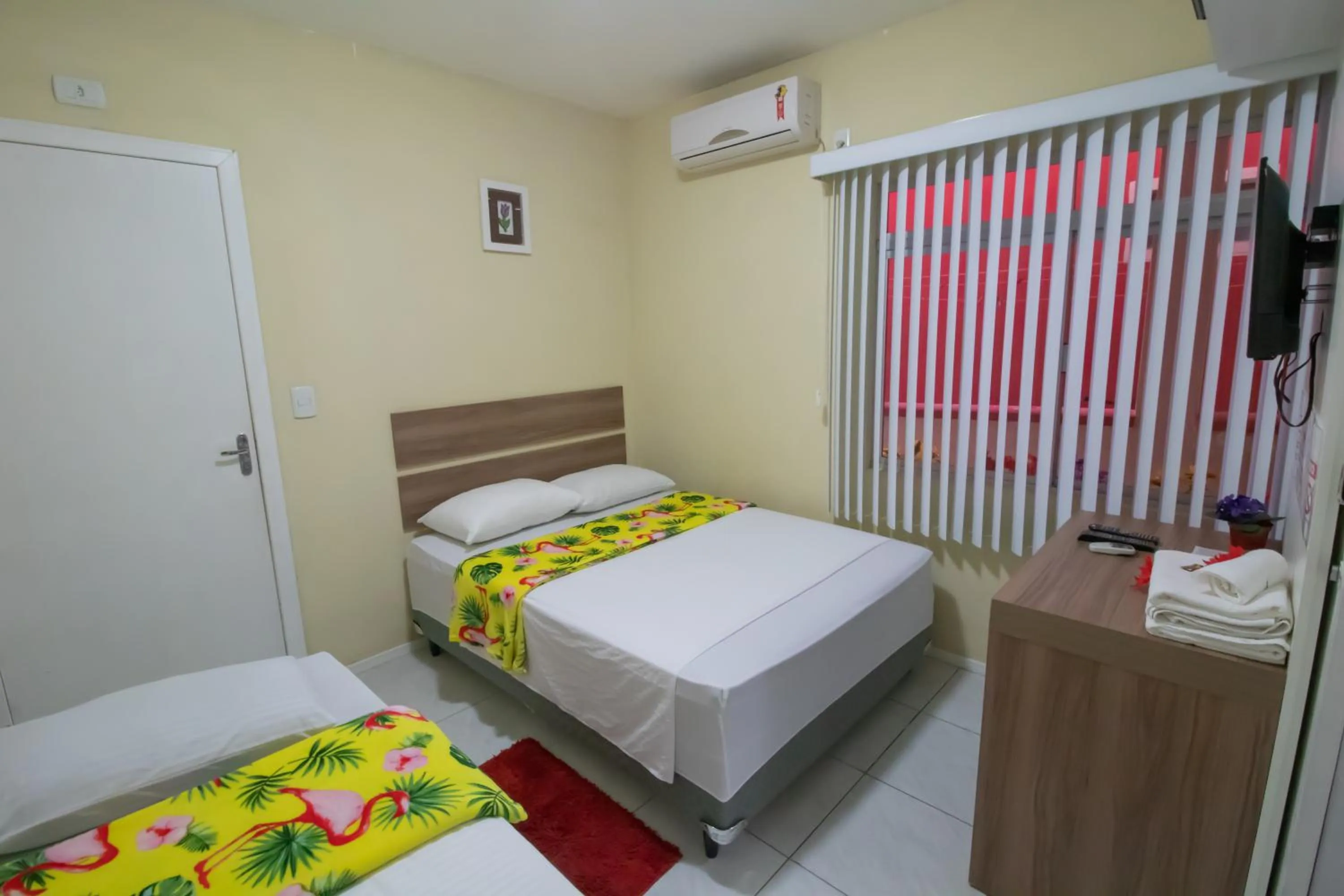 Bed in Pousada Vovó Dilma