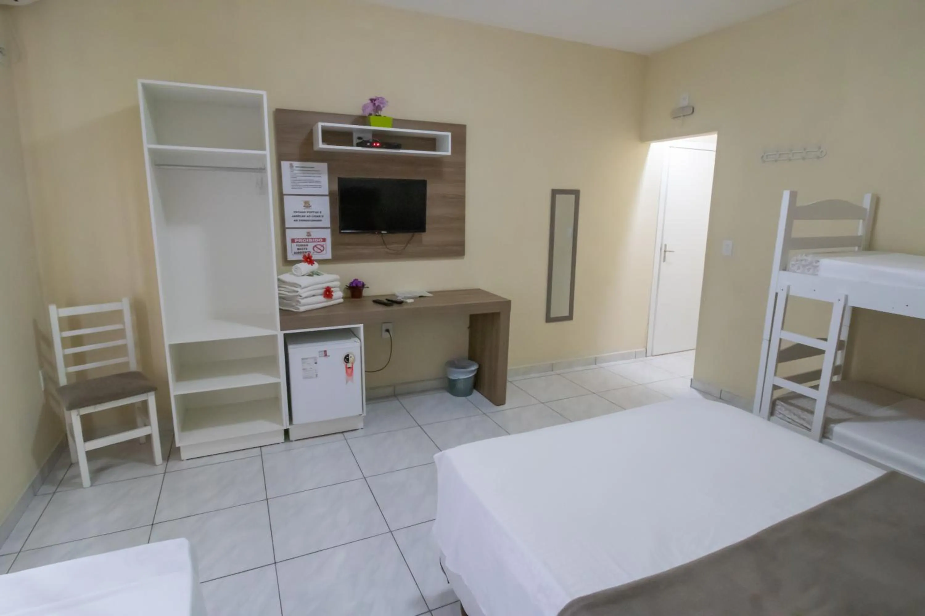 Bed in Pousada Vovó Dilma