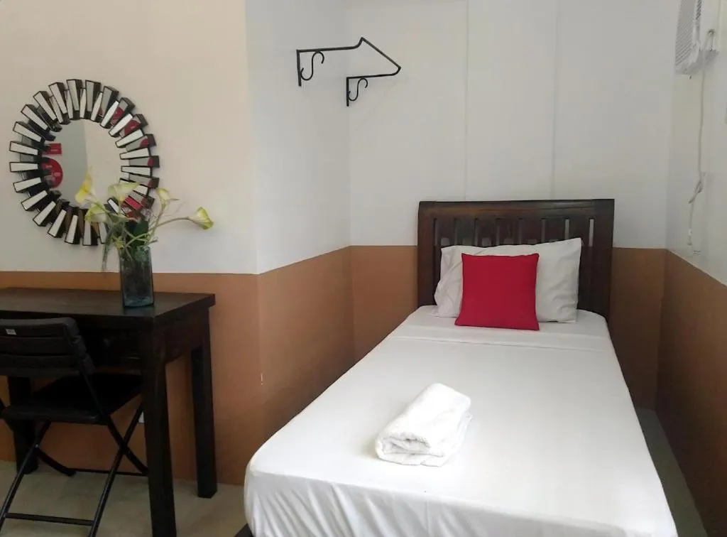 Bed in Jil's Apartelle