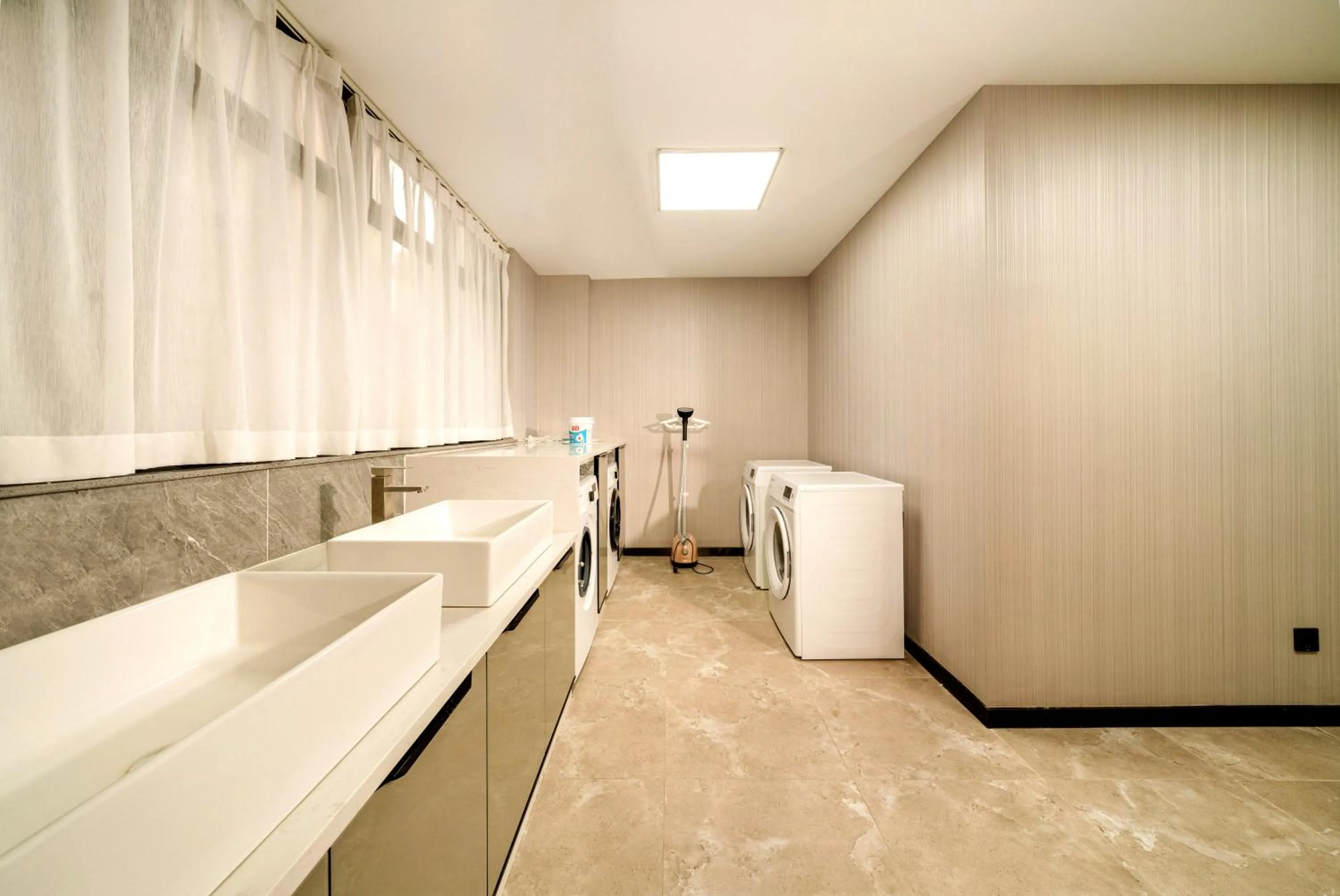 washing machine in Echarm Hotel Wuzhou Canghai Lake High Speed Railway Station