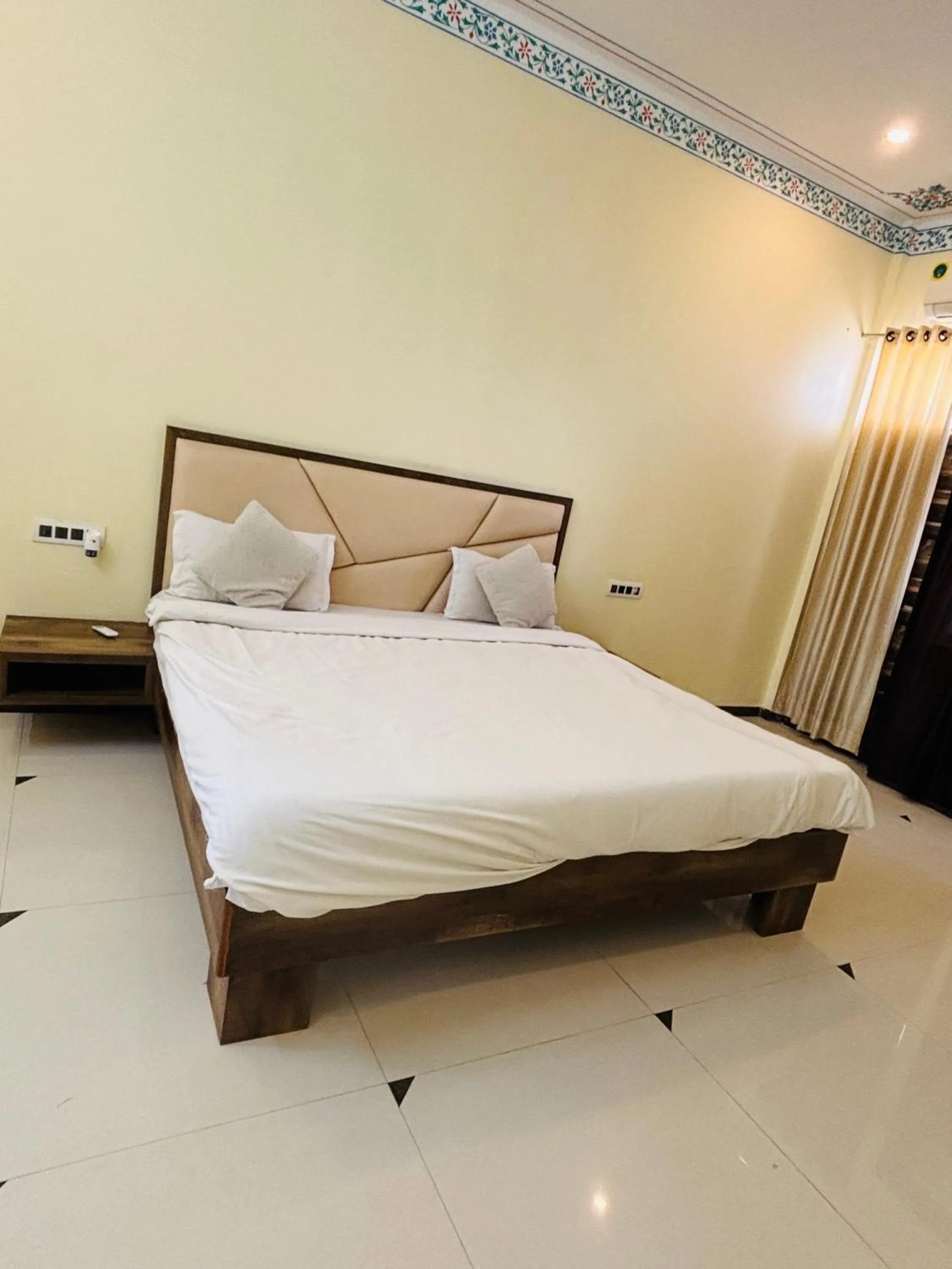 Bed in Shiv Ashray Resort