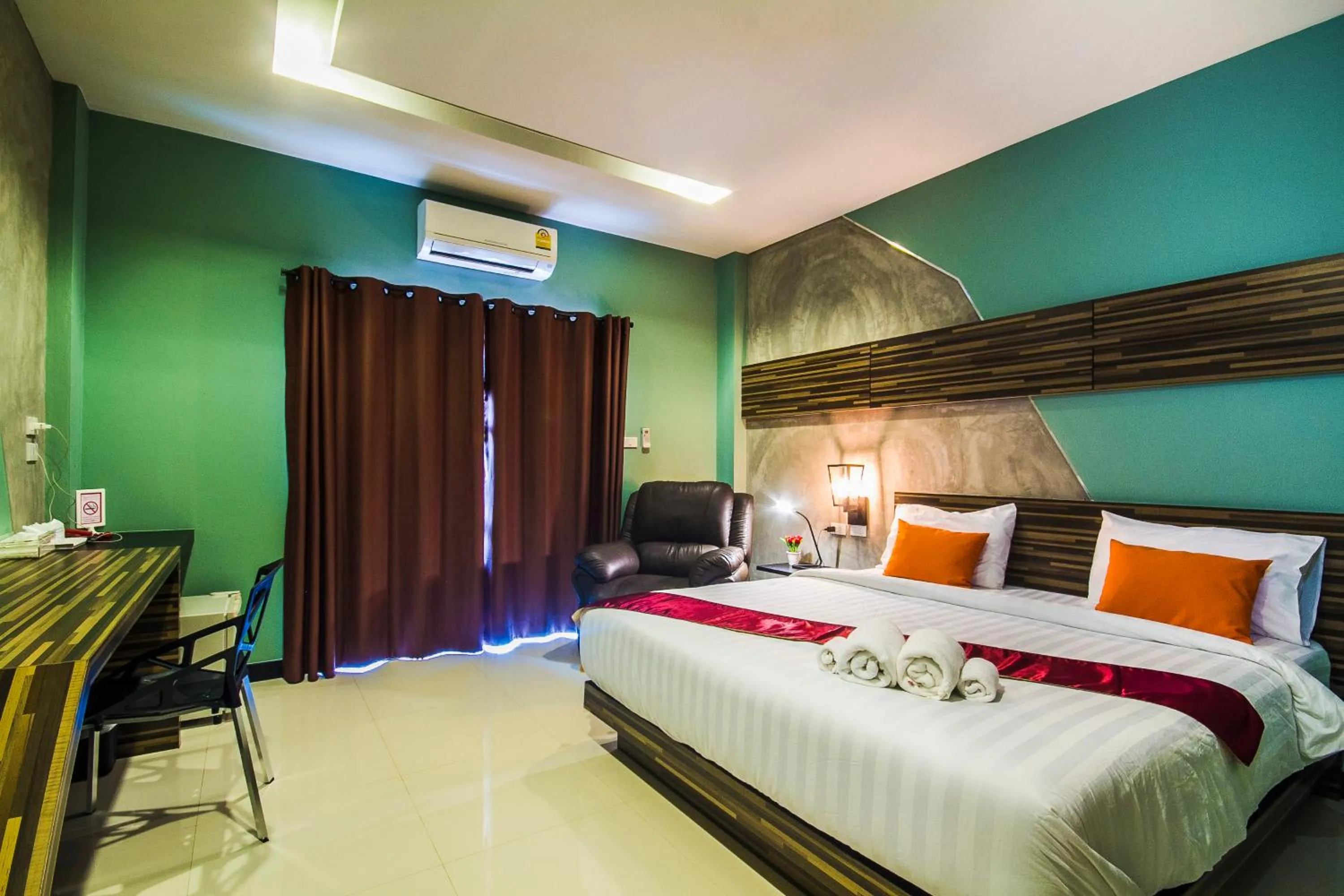 Bed in Ray Hotel Buriram