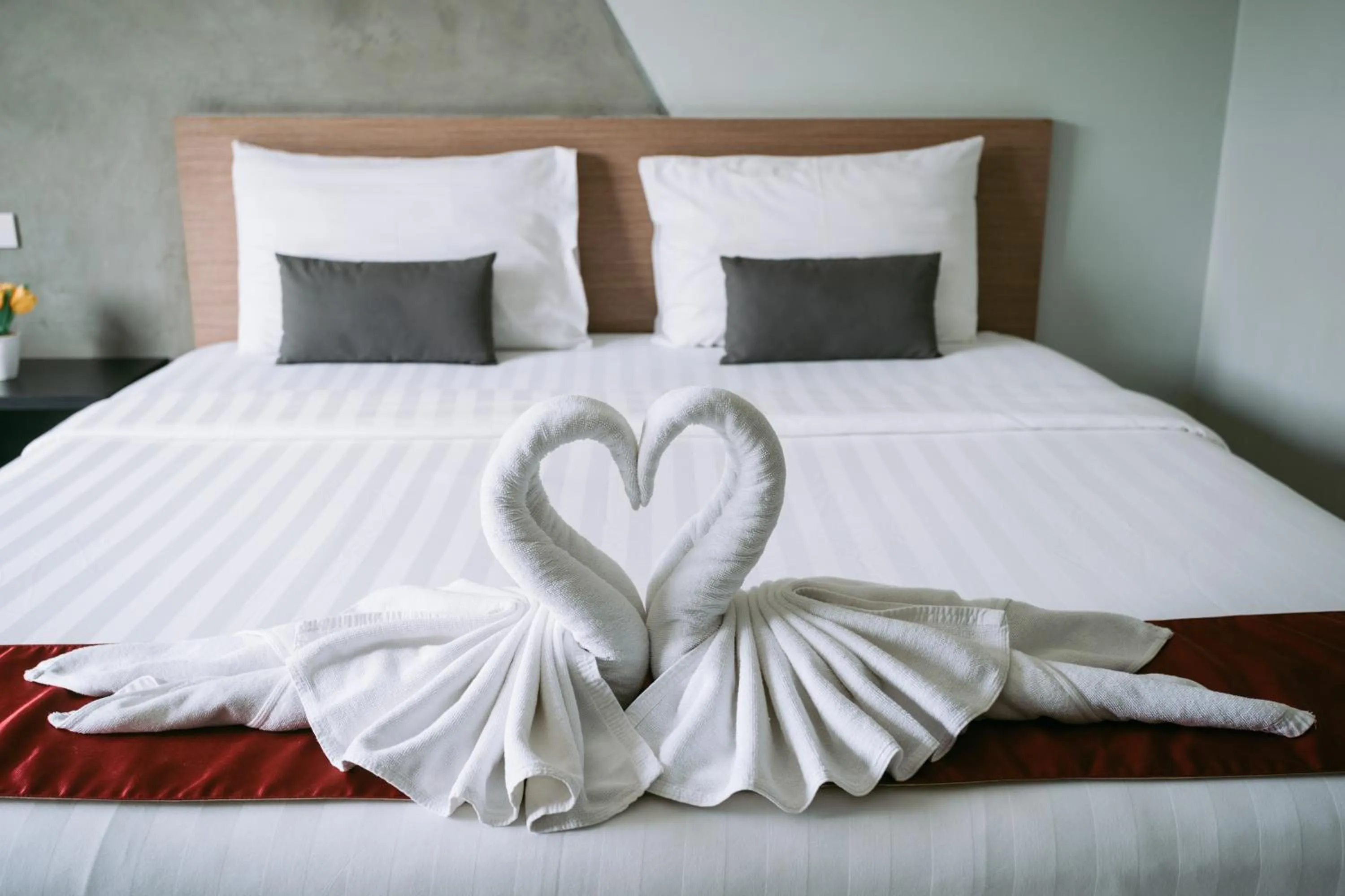 Bed in Ray Hotel Buriram