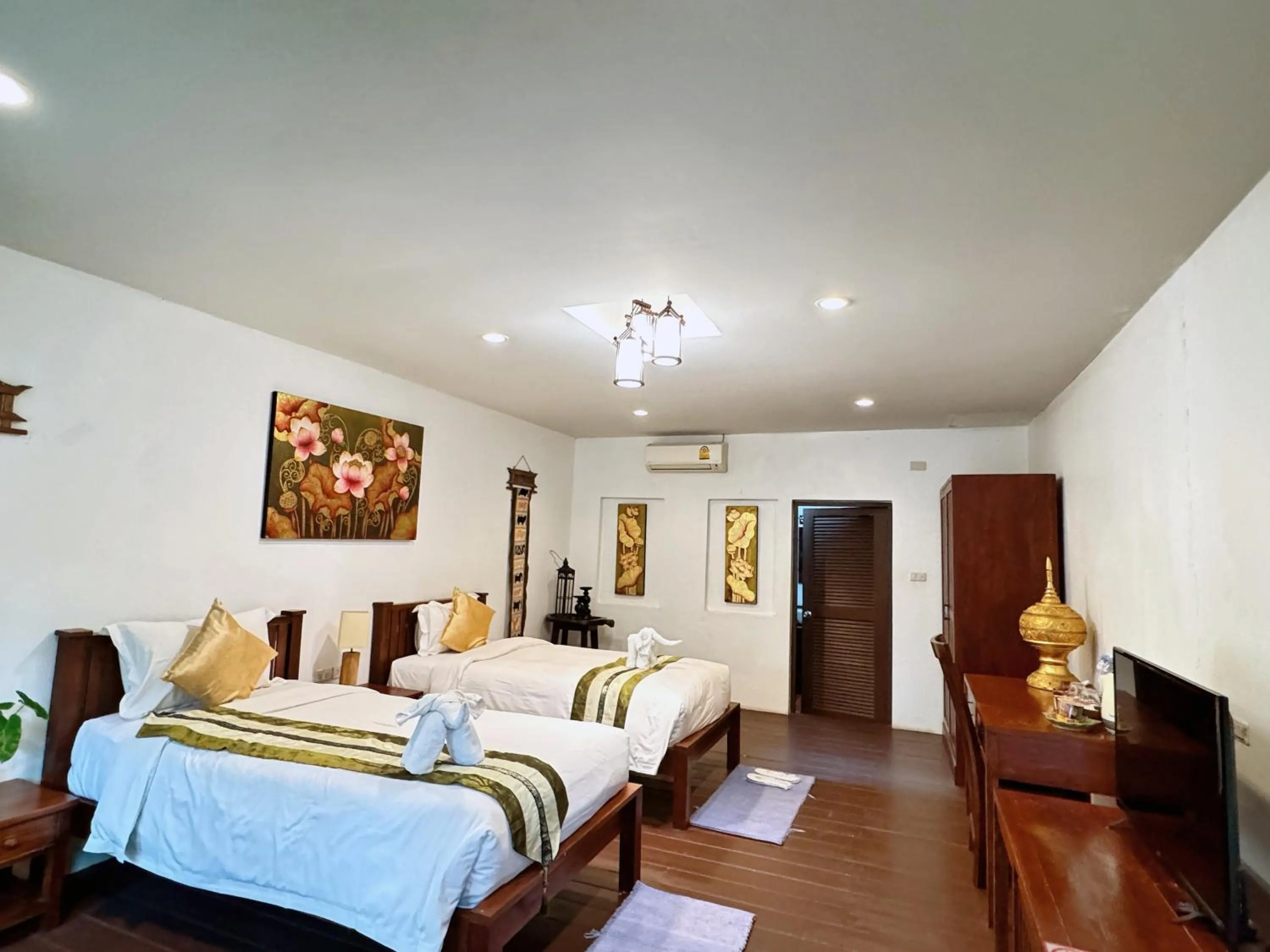 Bed in E-outfitting Boutique Chiang Mai