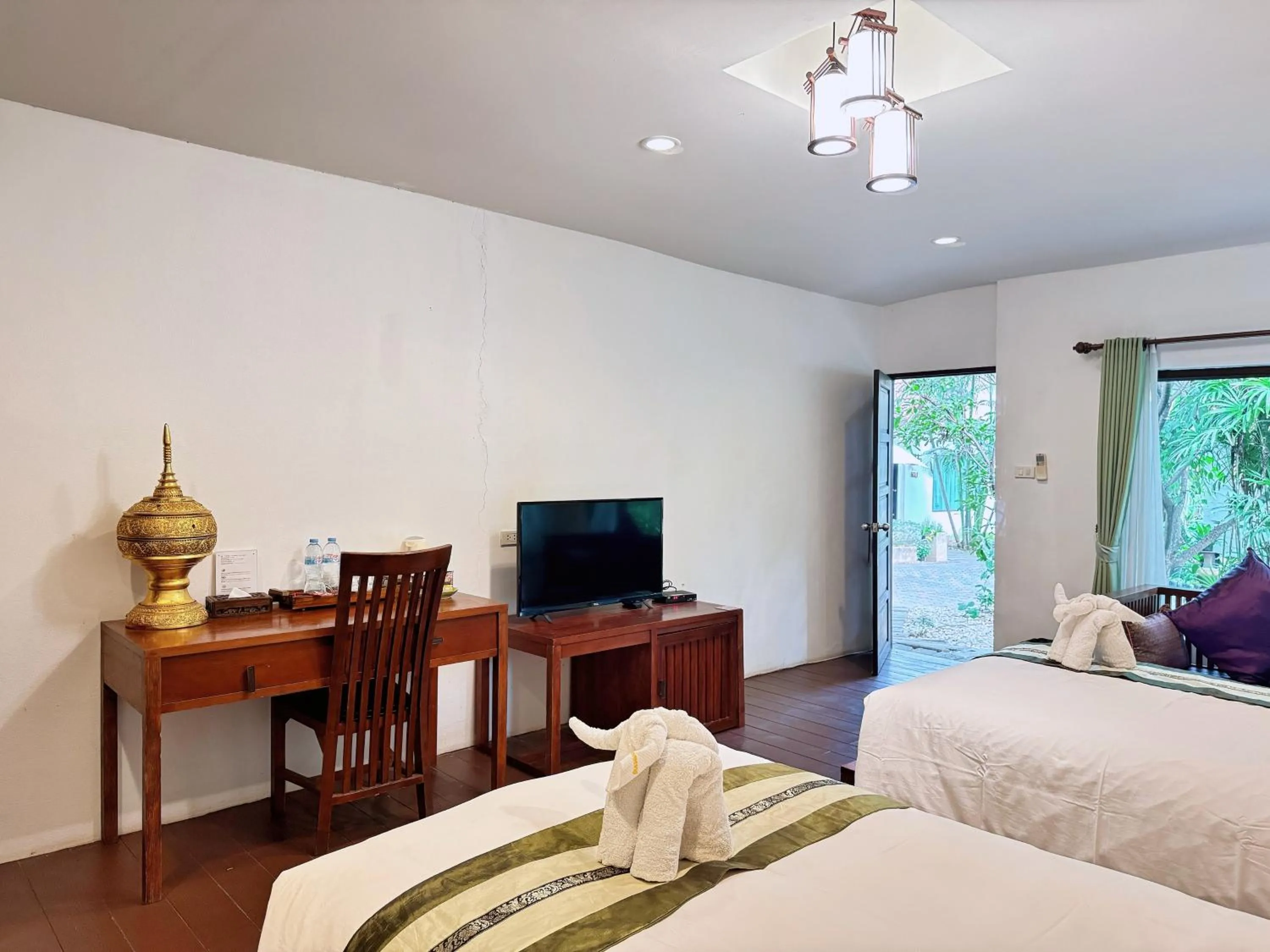 Bed in E-outfitting Boutique Chiang Mai