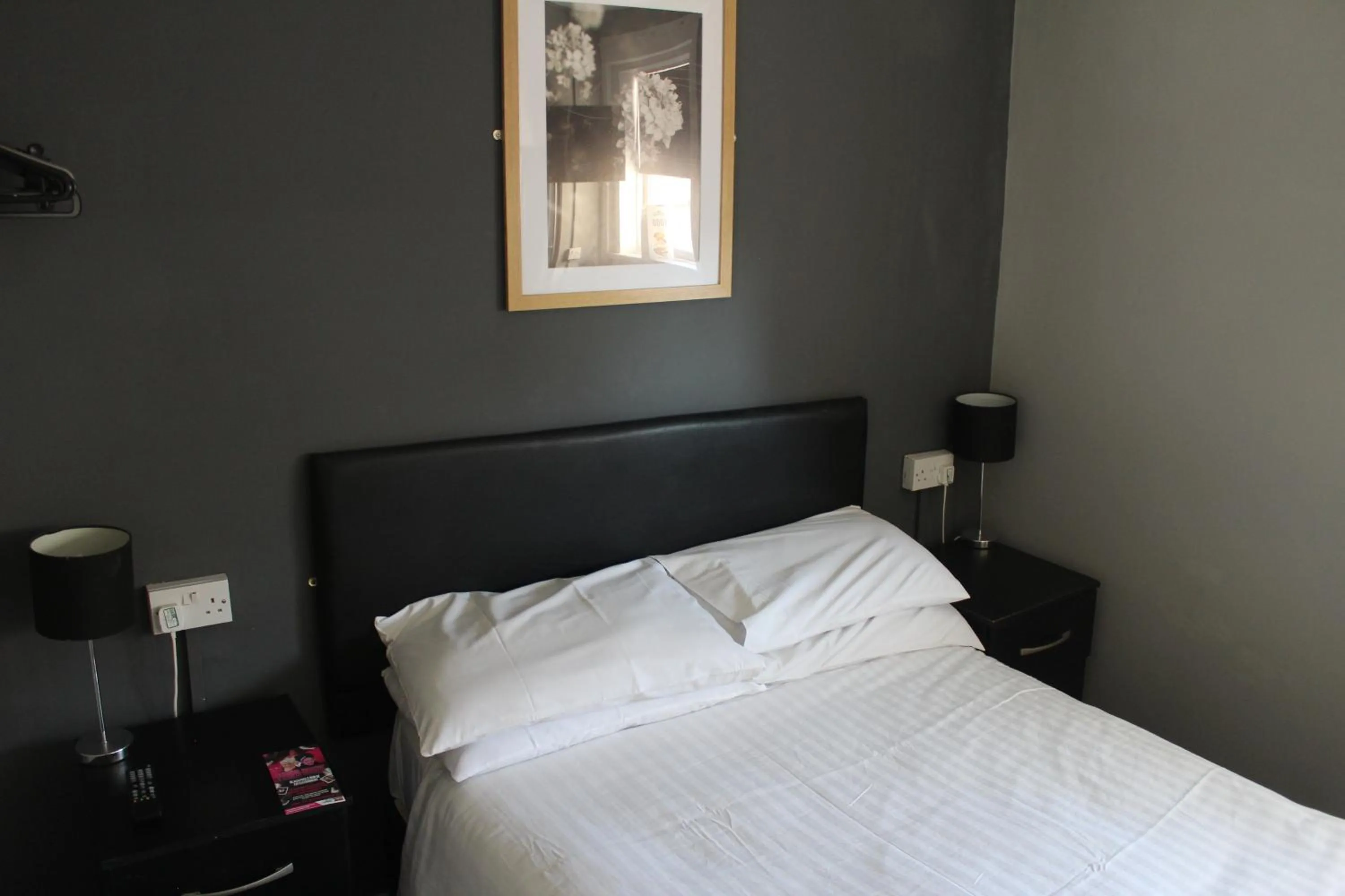 Bed in Peek-a-Booze - Budget Hotel - Adults Only