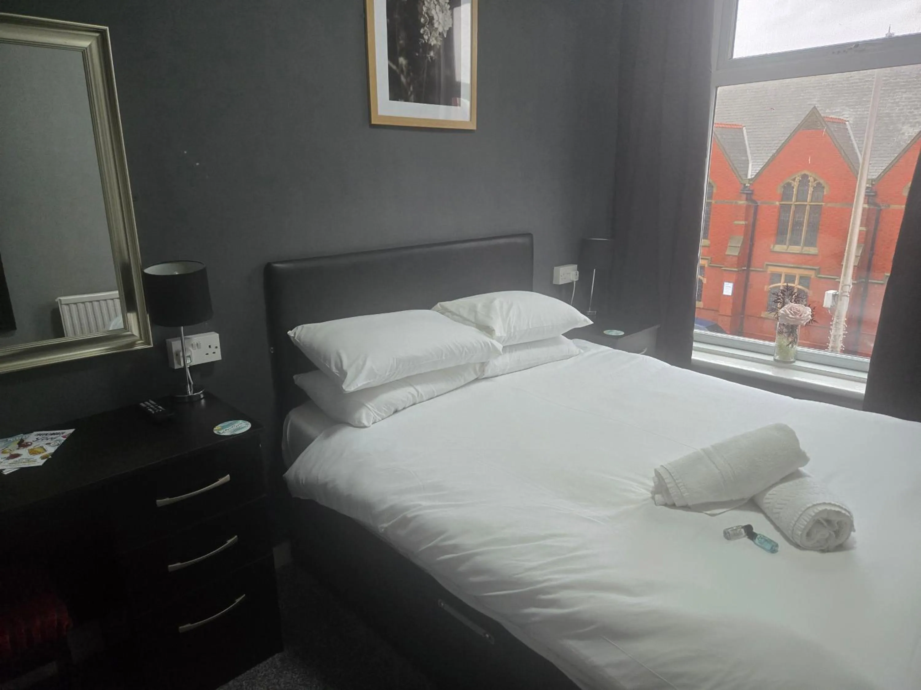 Bed in Peek-a-Booze - Budget Hotel - Adults Only