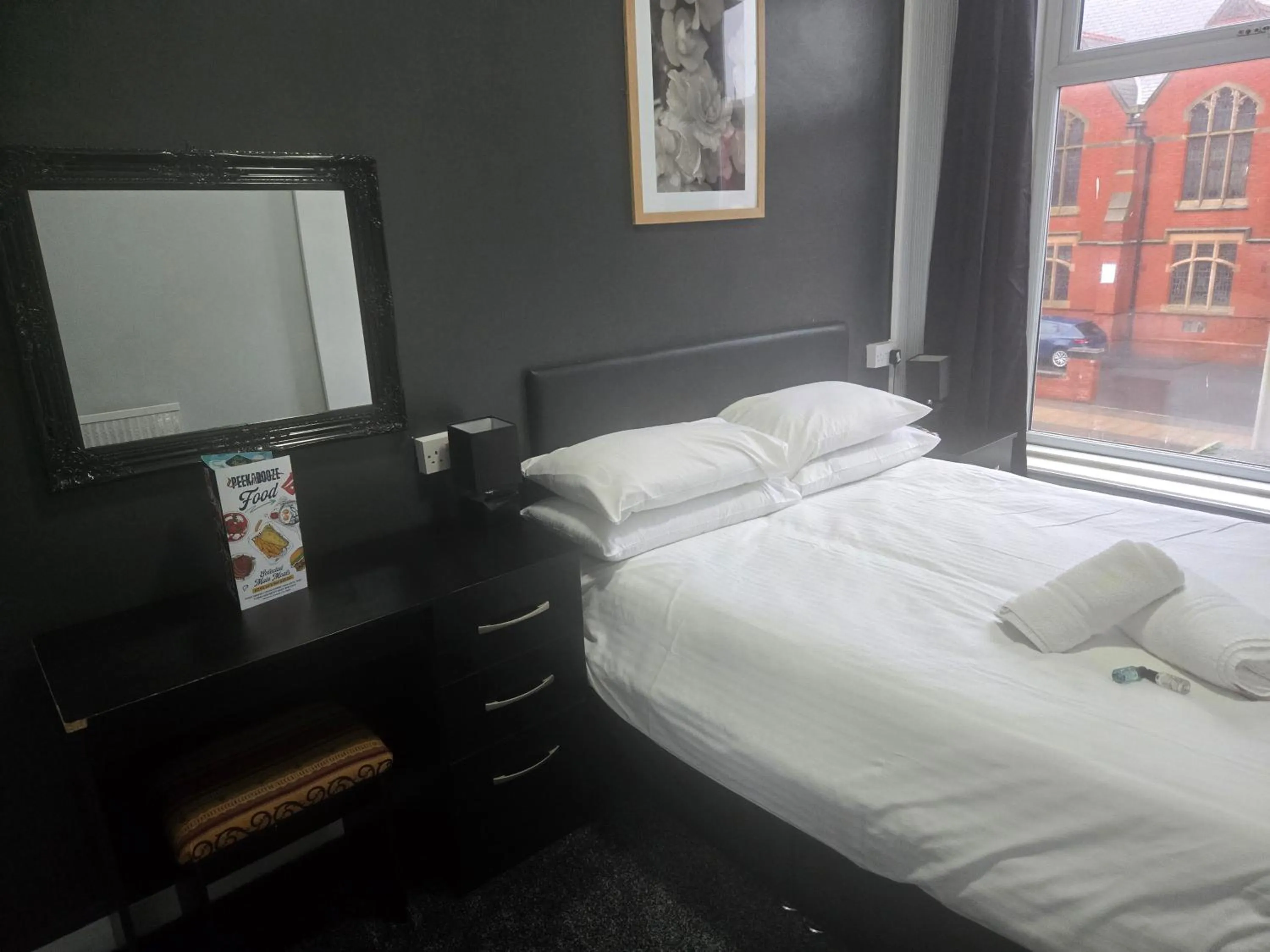 Bed in Peek-a-Booze - Budget Hotel - Adults Only