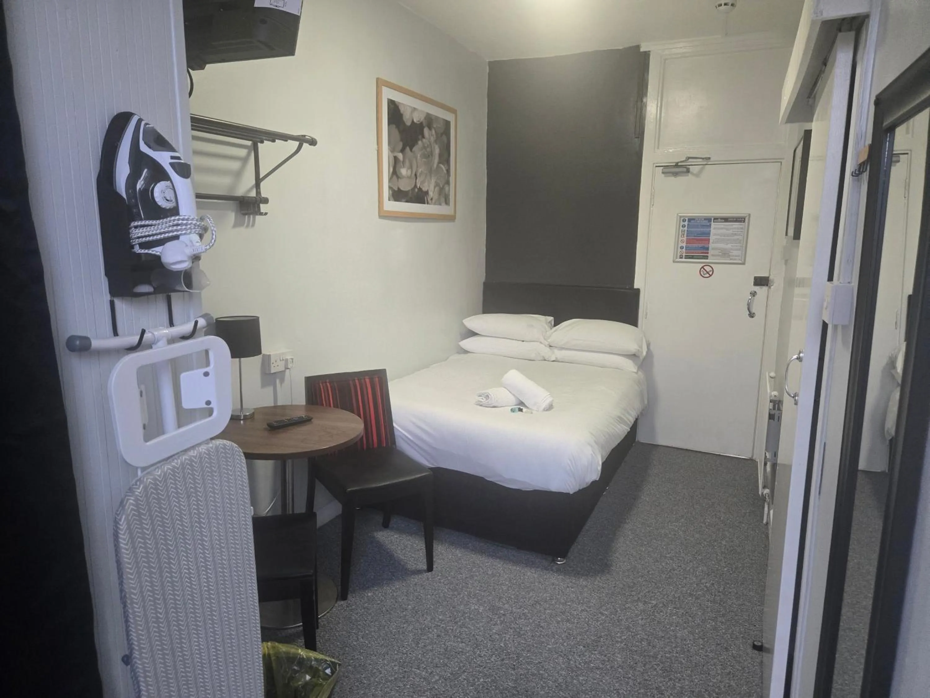 Bed in Peek-a-Booze - Budget Hotel - Adults Only