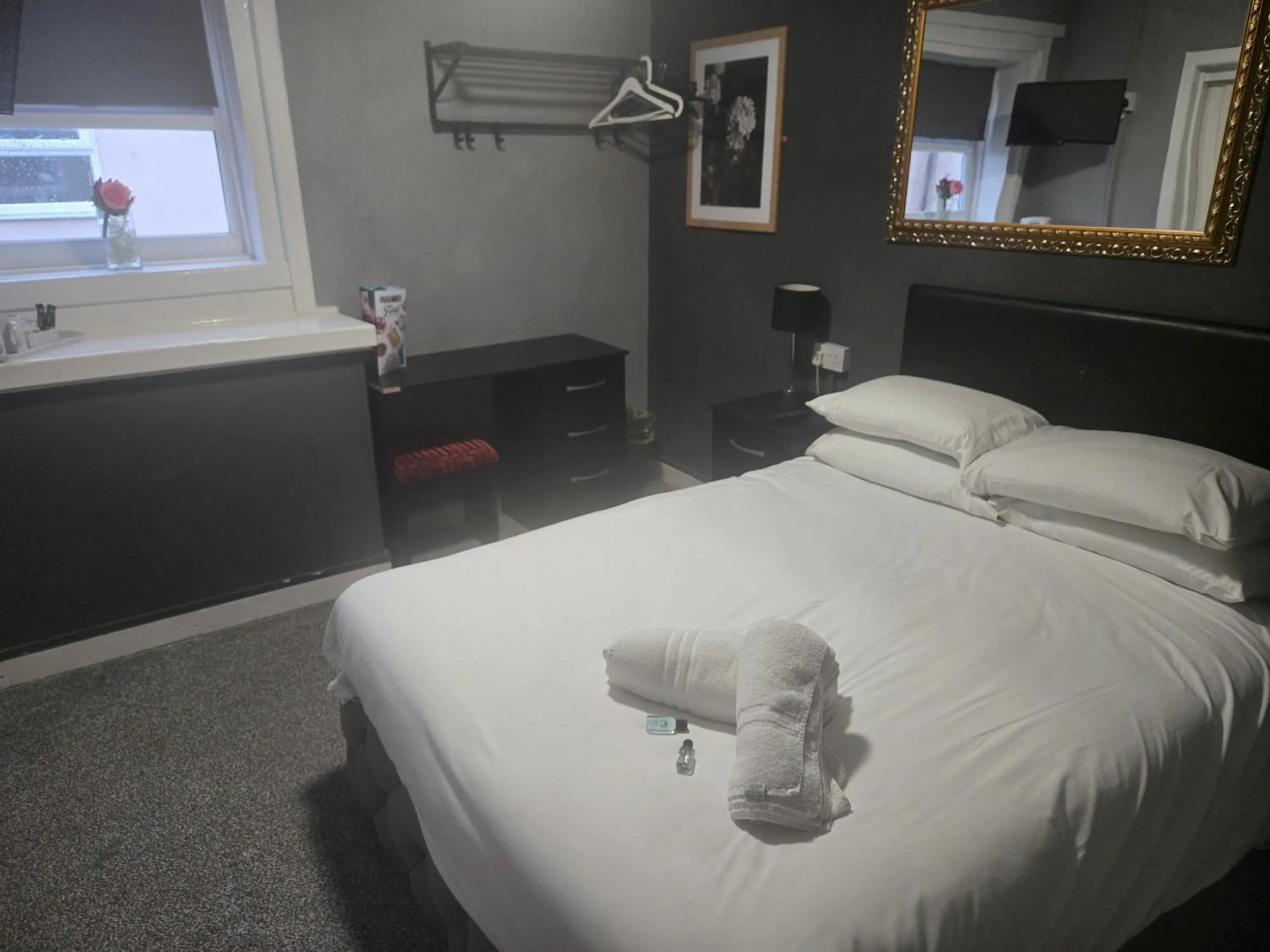 Bed in Peek-a-Booze - Budget Hotel - Adults Only