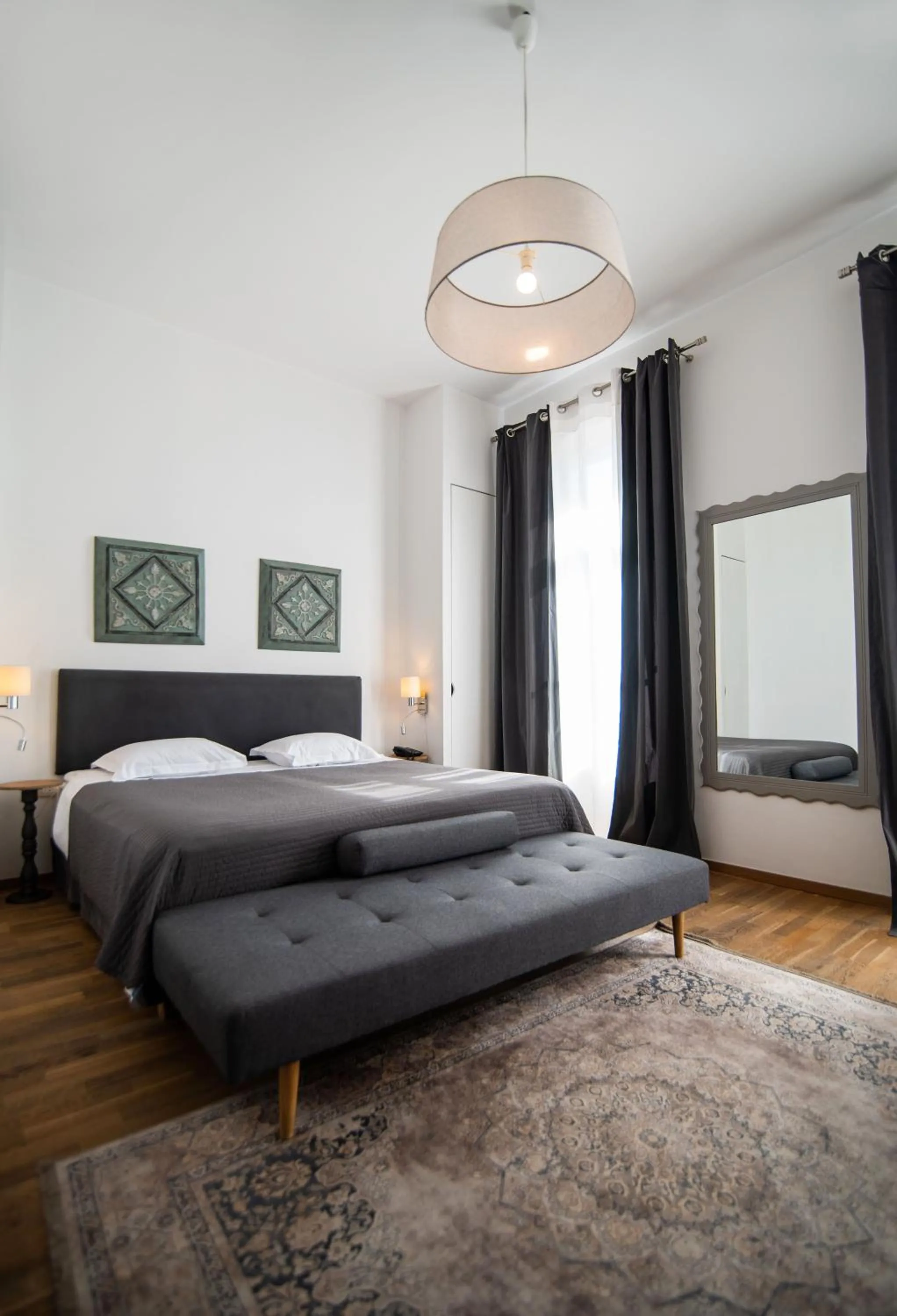 Bed in Emporikon Athens Hotel