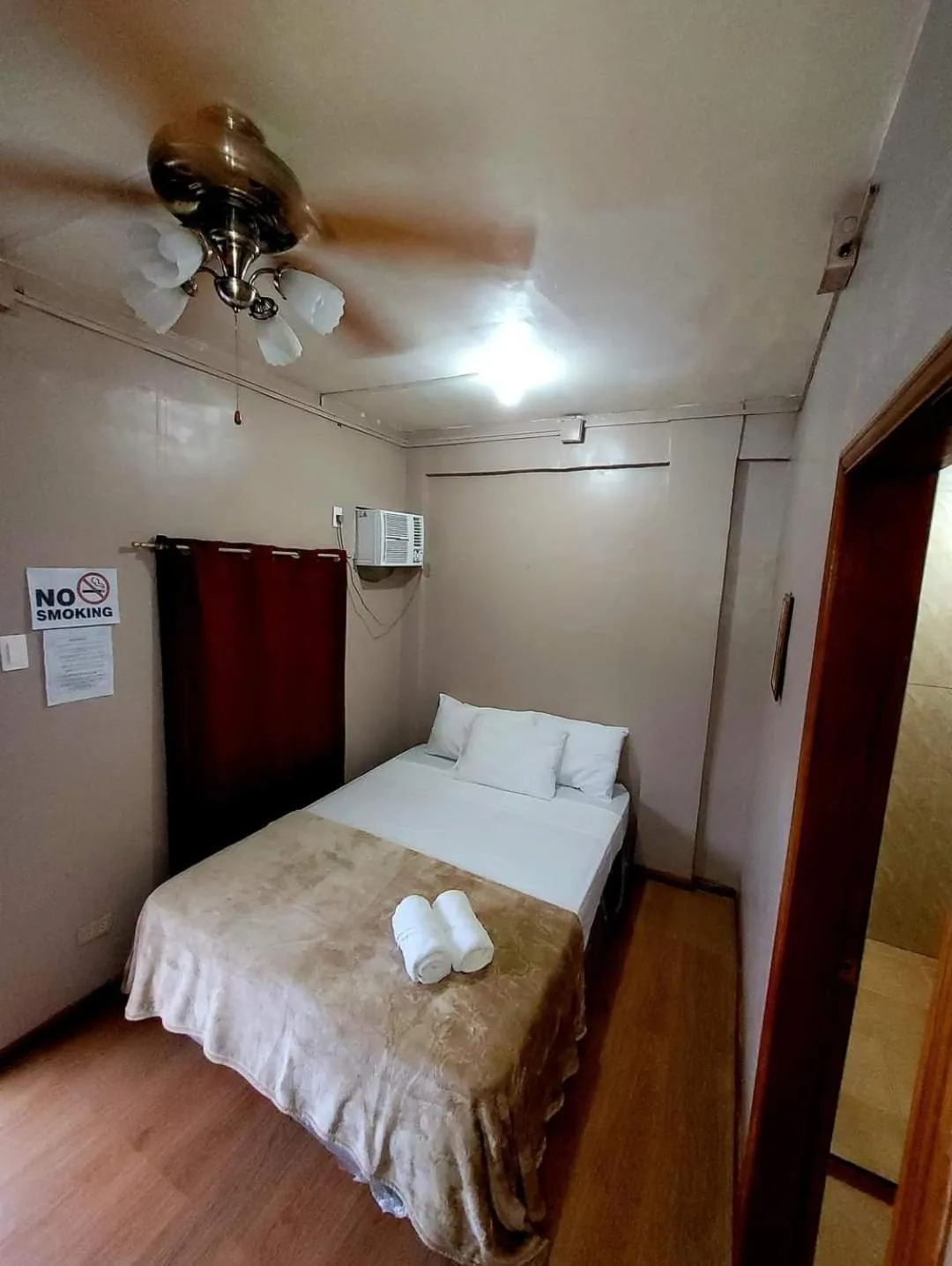 Bed in J & V Oceanview Beach Resort