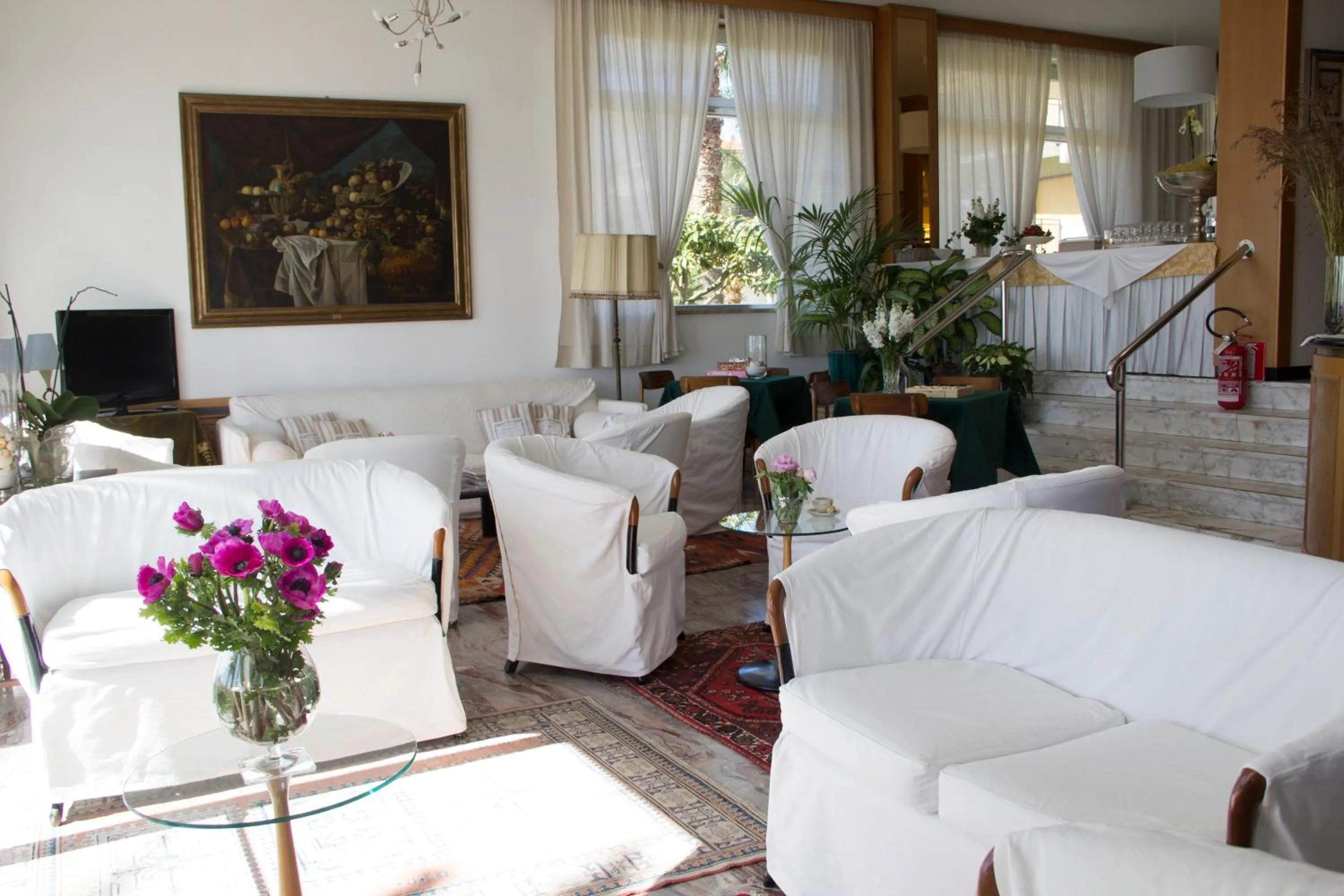 Communal lounge/ TV room in Hotel Miramare