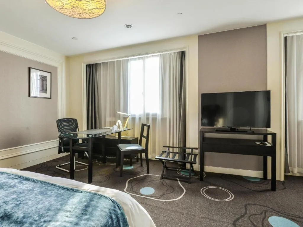 Bed in Jinjiang Metropolo Hotel Classiq YMCA People Square