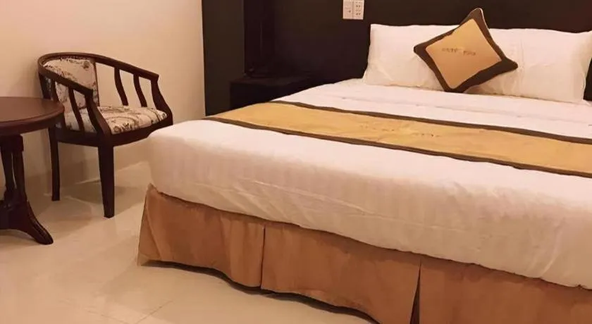 Bed in LUCKY STAR HOTEL