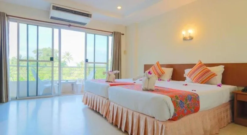 Bed in Wild Orchid Villa Krabi