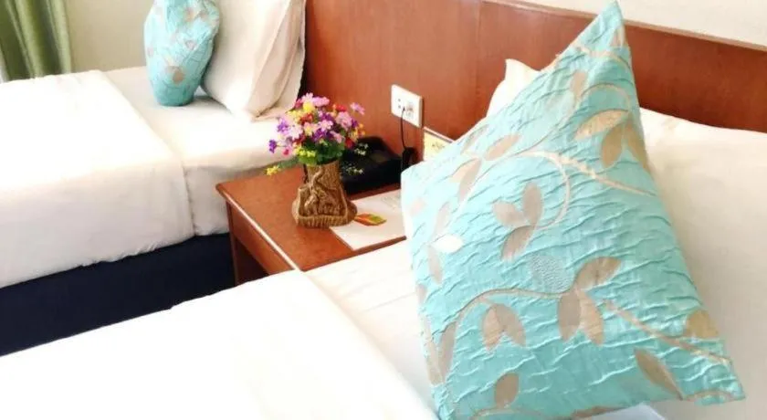 Bed in Wild Orchid Villa Krabi