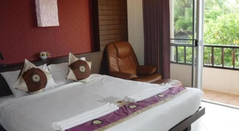 Bed in Wild Orchid Villa Krabi