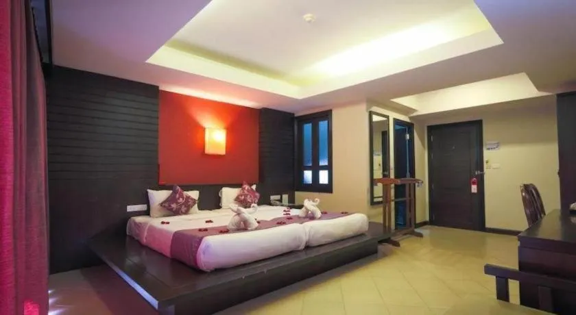 Bed in Wild Orchid Villa Krabi