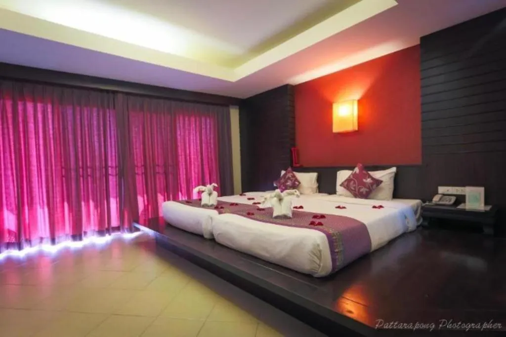 Bed in Wild Orchid Villa Krabi