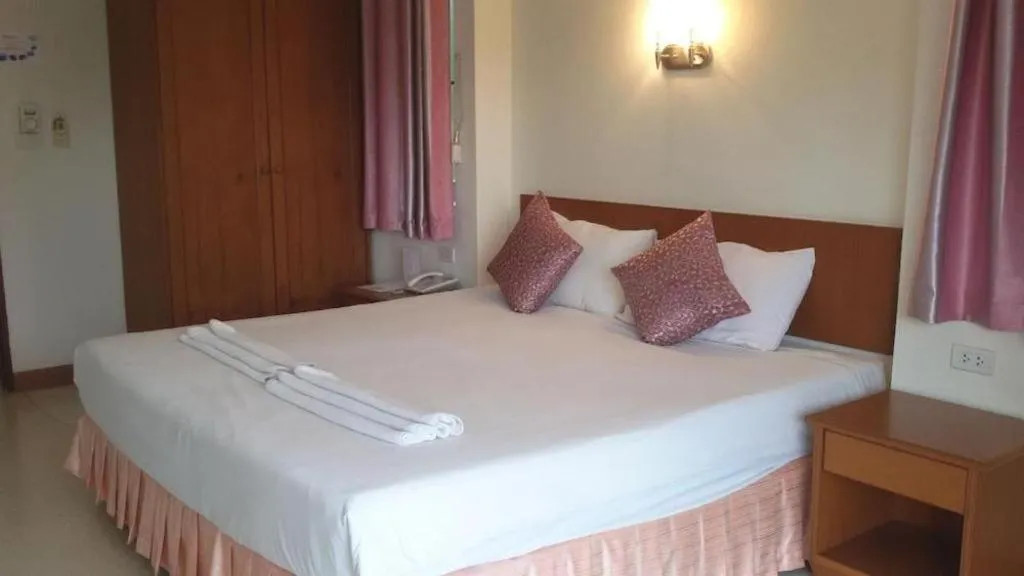 Bed in Wild Orchid Villa Krabi