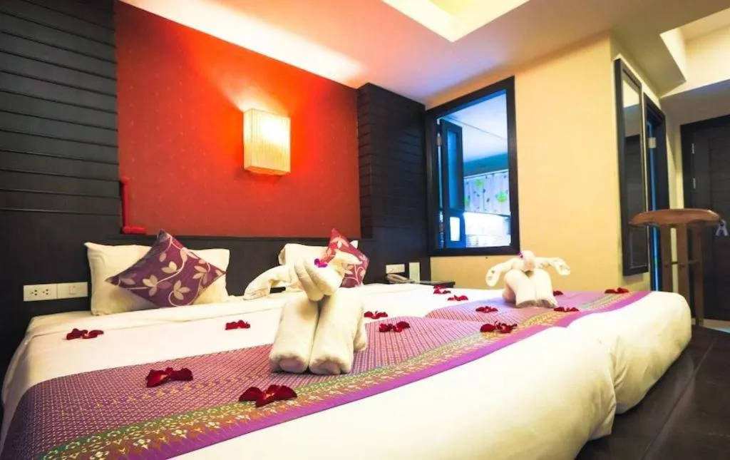 Bed in Wild Orchid Villa Krabi