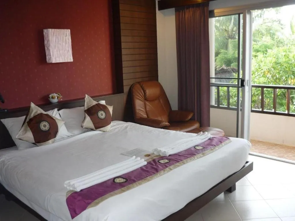 Bed in Wild Orchid Villa Krabi