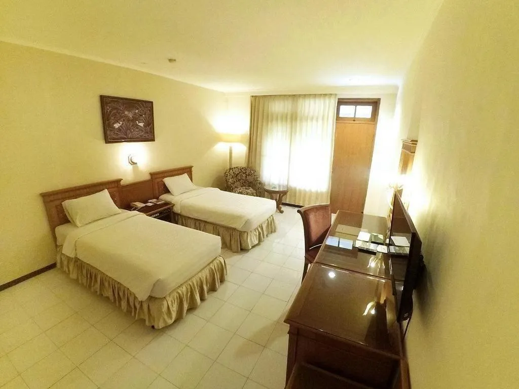 Bed in Purnama Hotel