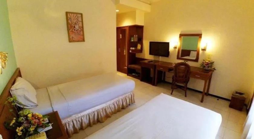 Bed in Purnama Hotel