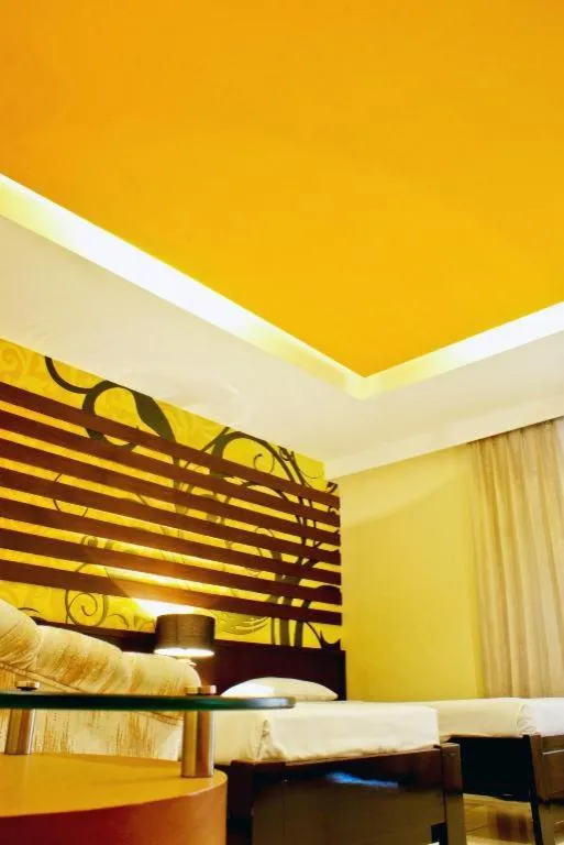 Bed in Purnama Hotel