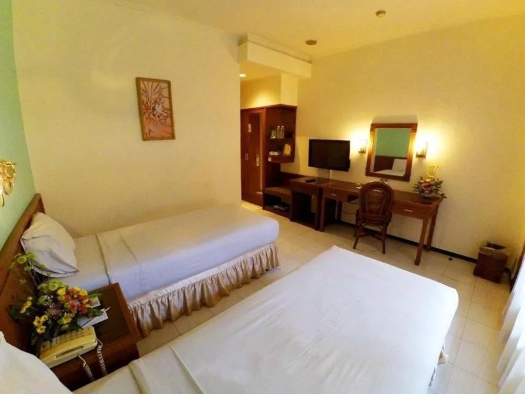 Bed in Purnama Hotel