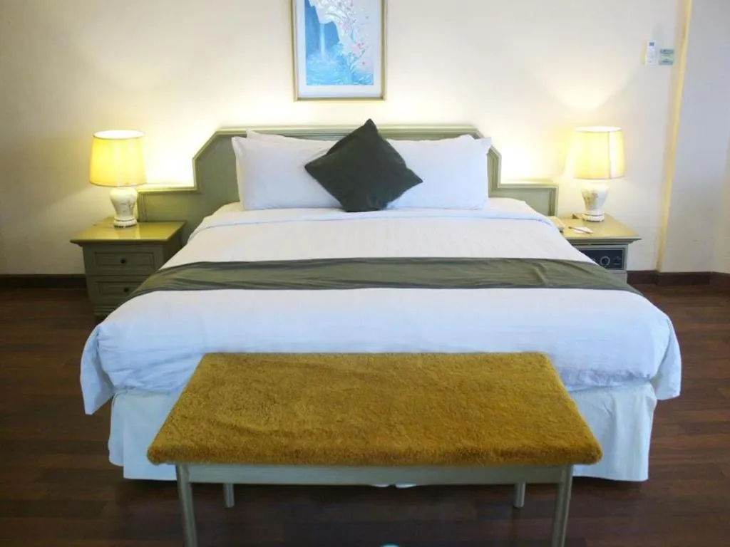 Bed in Purnama Hotel